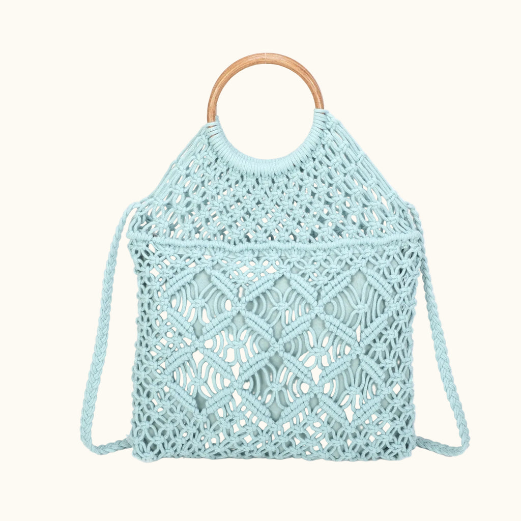 Light blue crochet bag with wooden handle on a white background