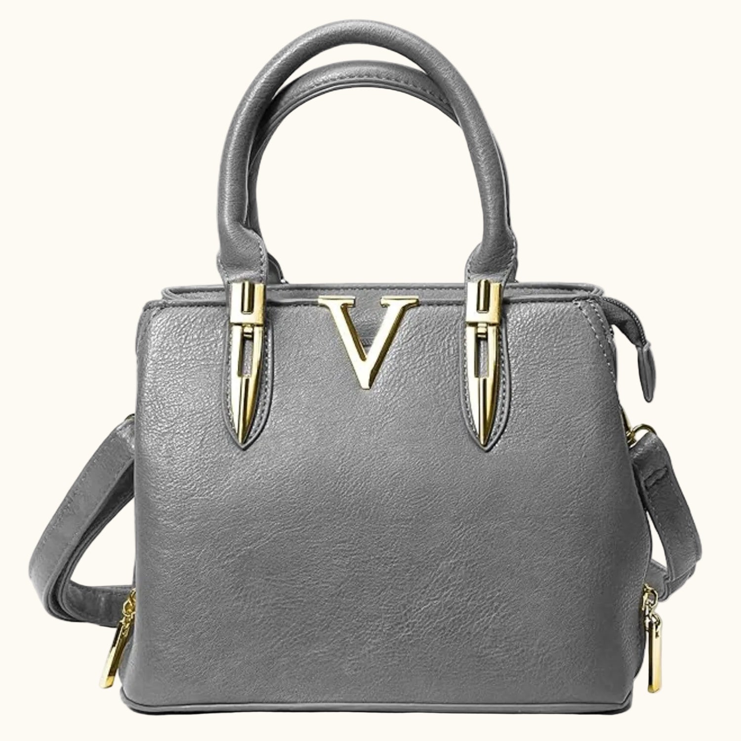 Gray handbag with gold accents on a white background