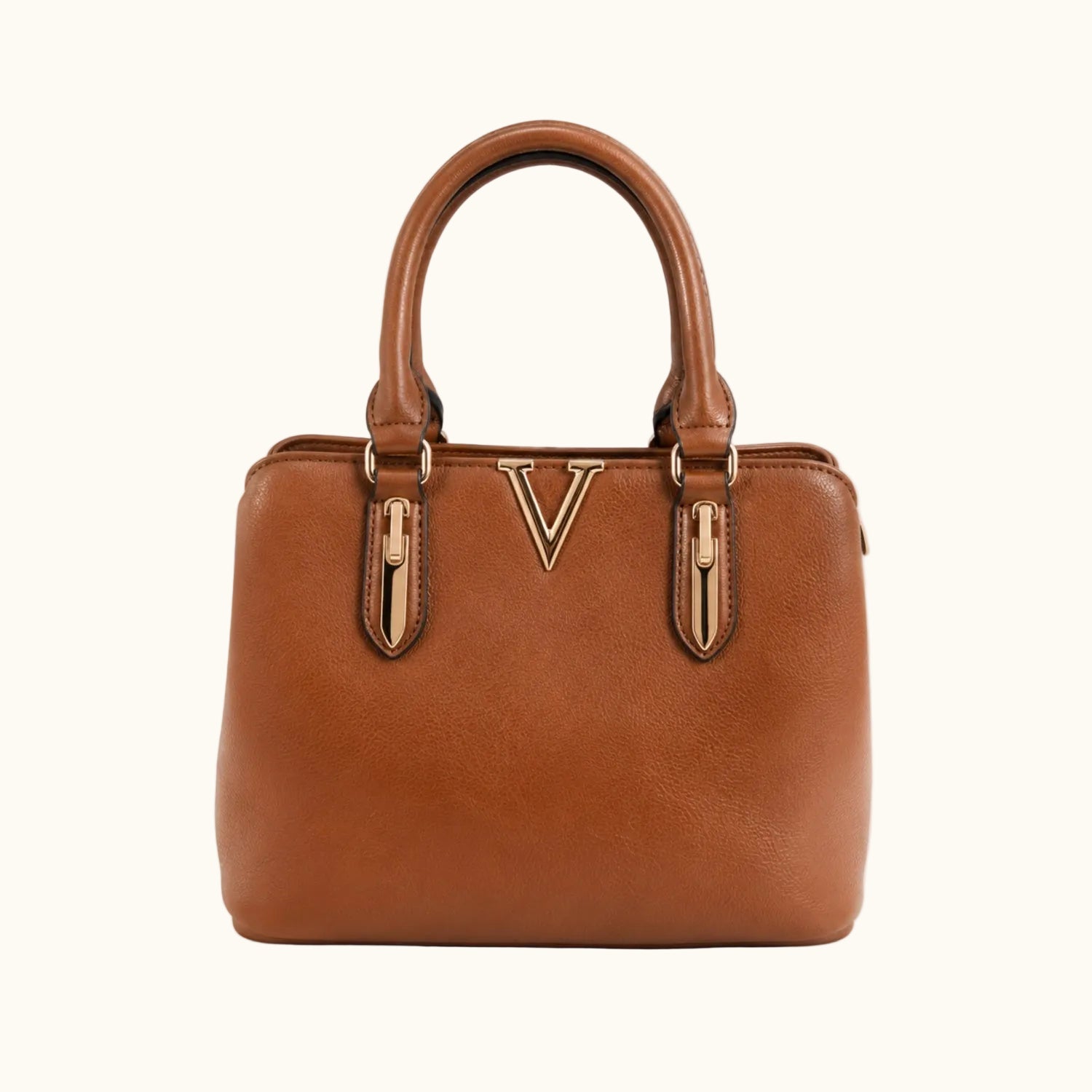 Brown handbag with gold accents on a white background
