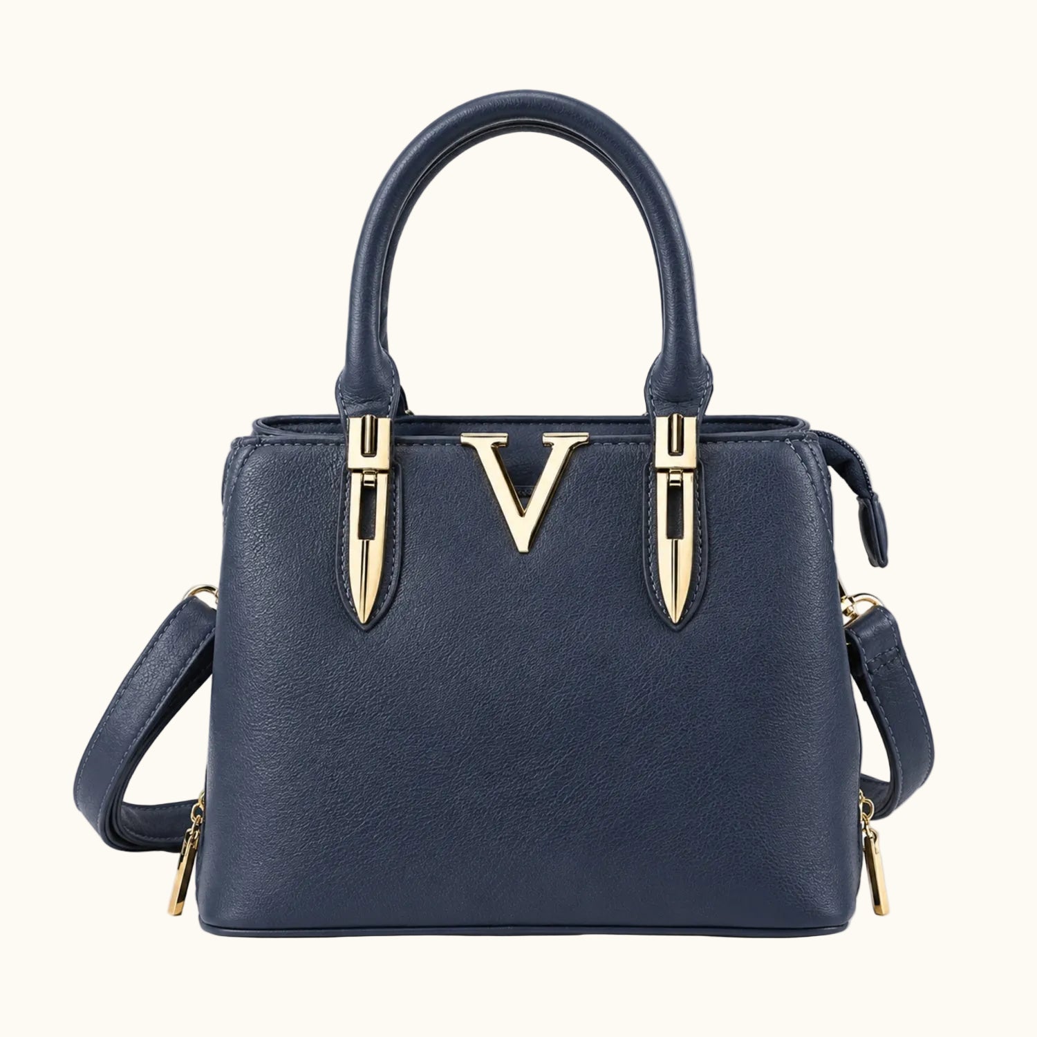 Navy blue handbag with gold accents on a white background