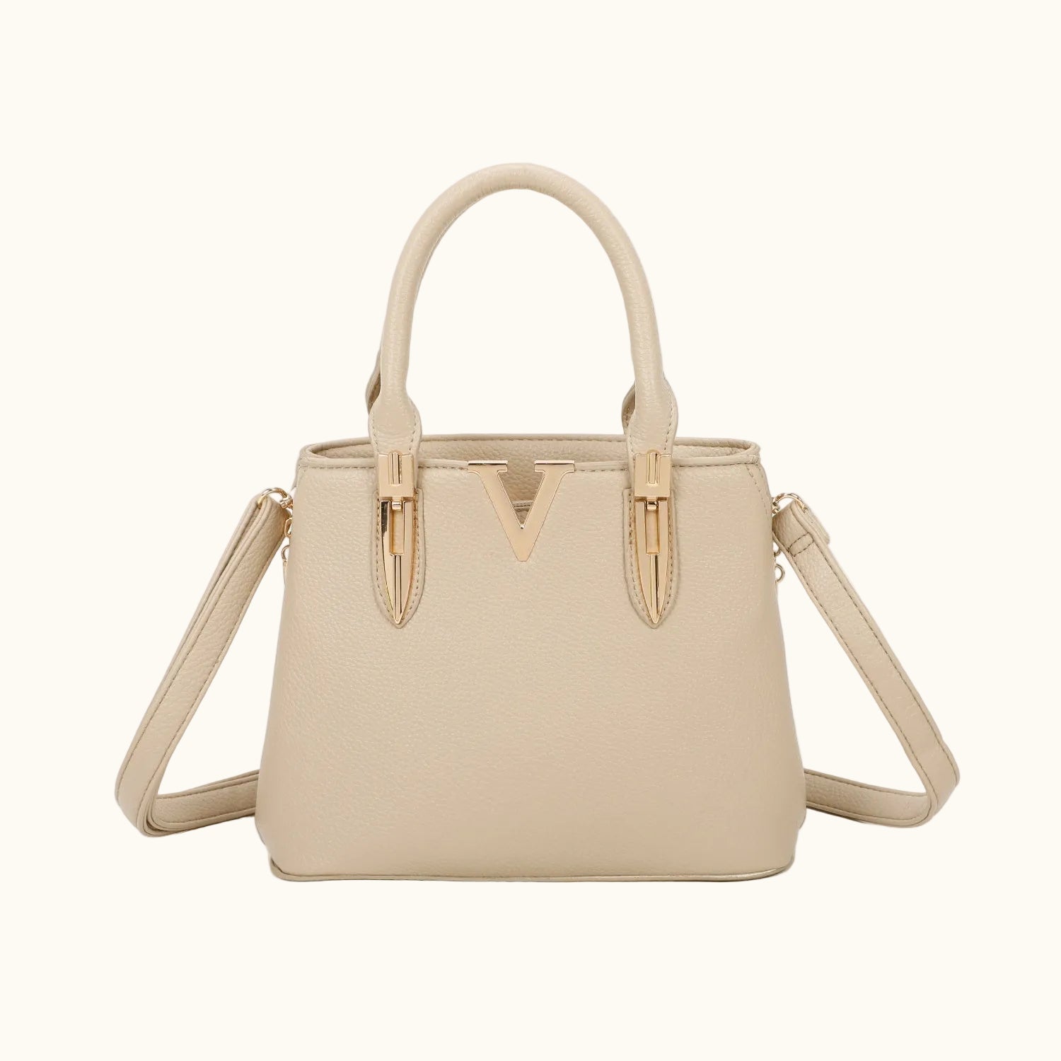 Beige handbag with a shoulder strap on a white background