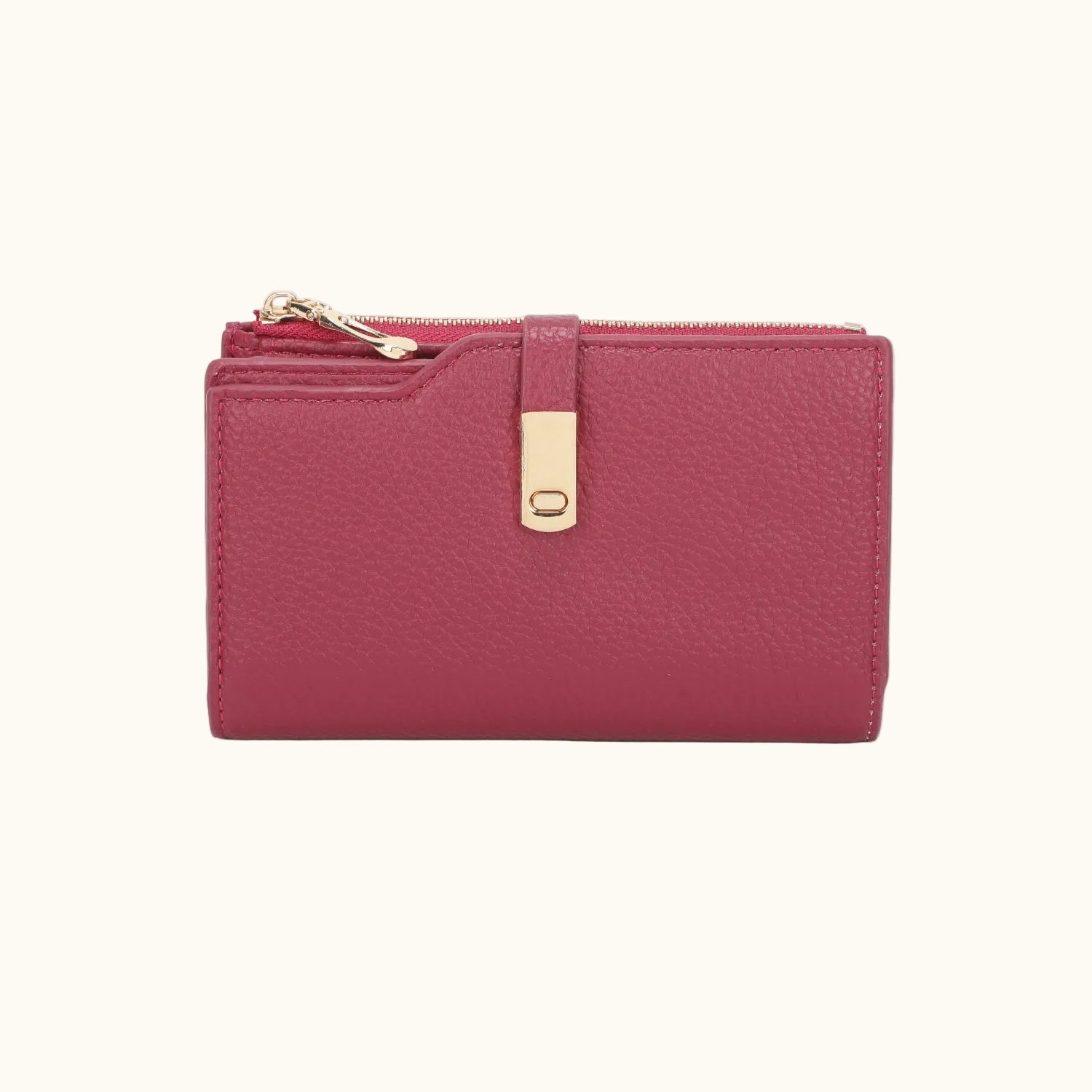 Pink wallet with a gold zipper on a white background