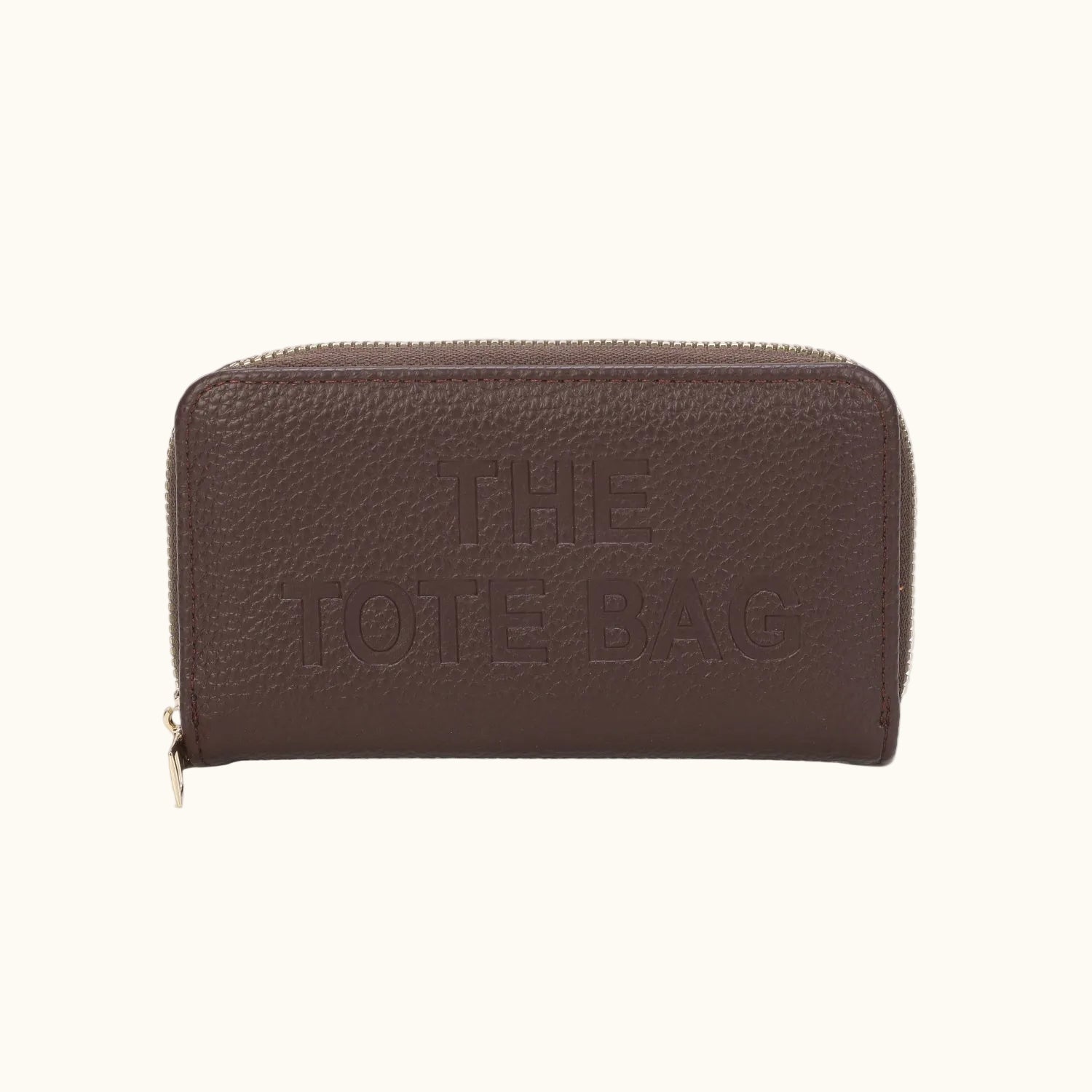 Brown leather wallet with 'THE TOTE BAG' embossed on a white background