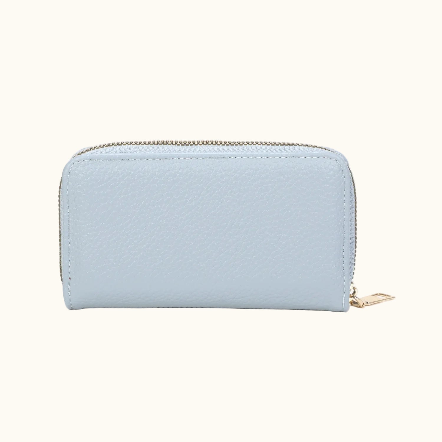 Light blue wallet with a gold zipper on a white background