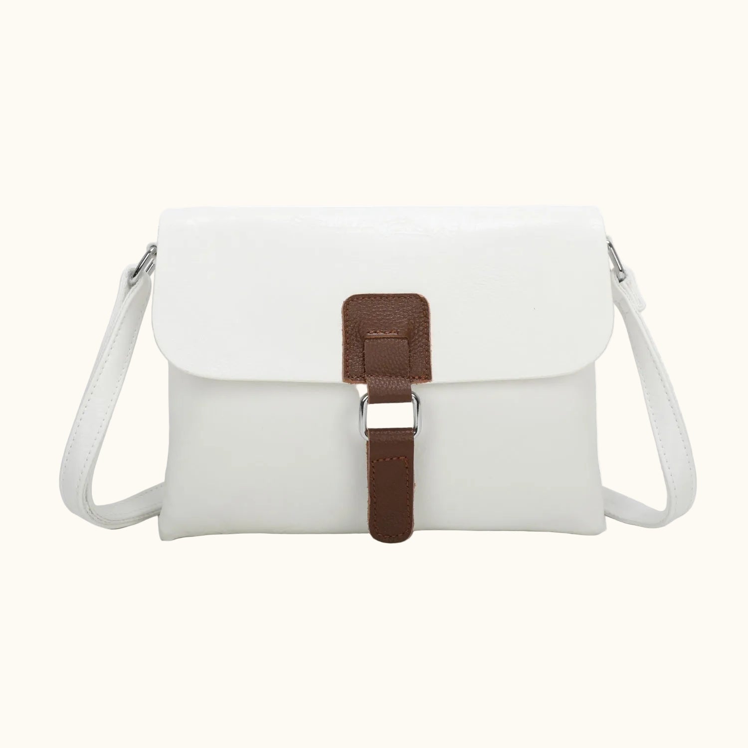 White handbag with a brown strap on a white background