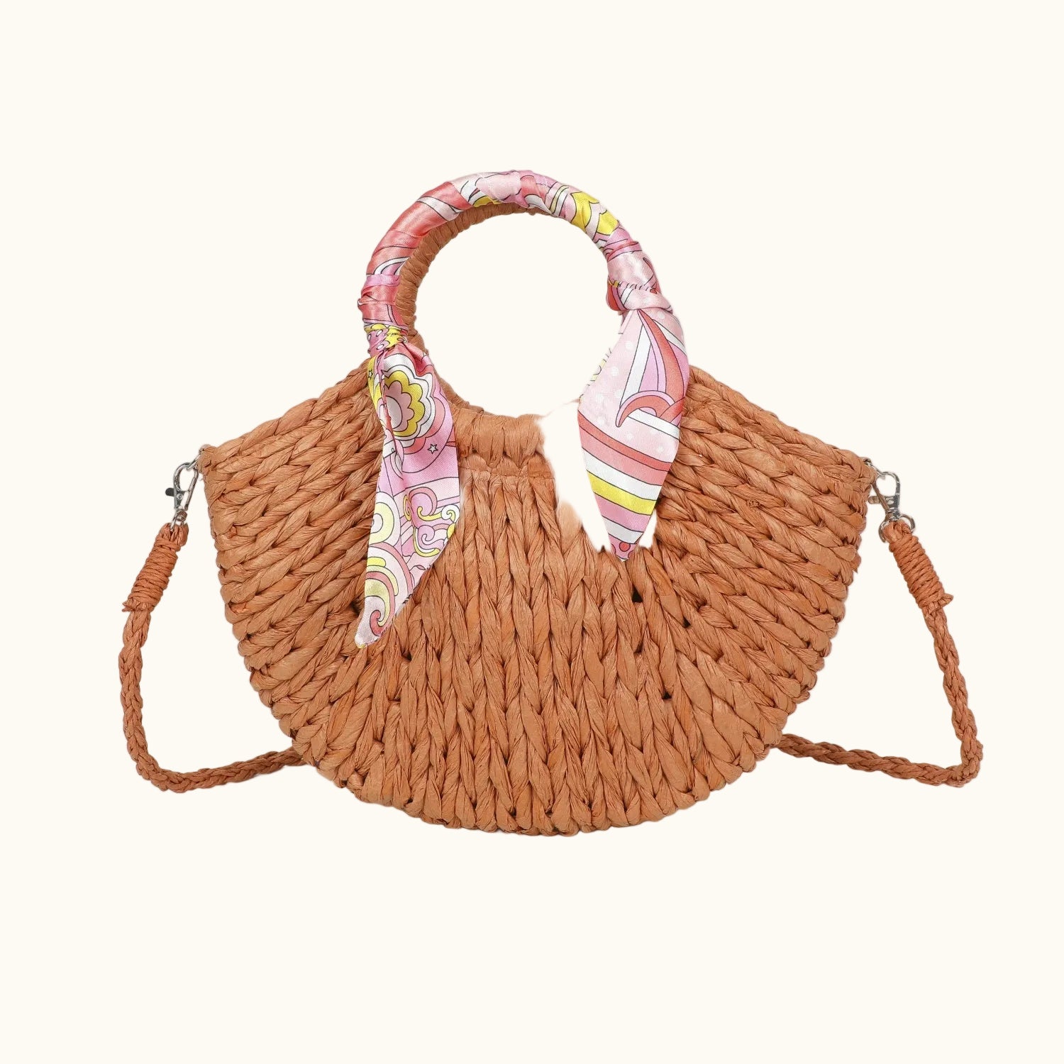 Woven handbag with a colorful handle on a white background