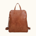 Brown leather backpack on a white background