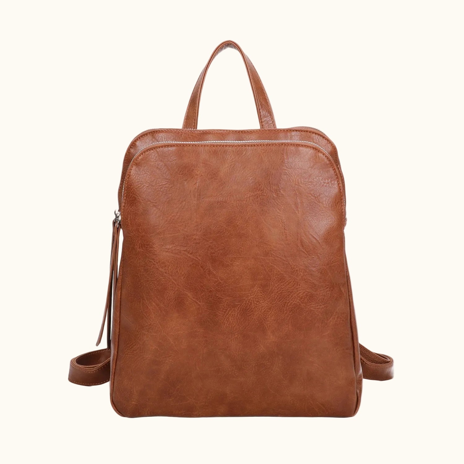Brown leather backpack on a white background