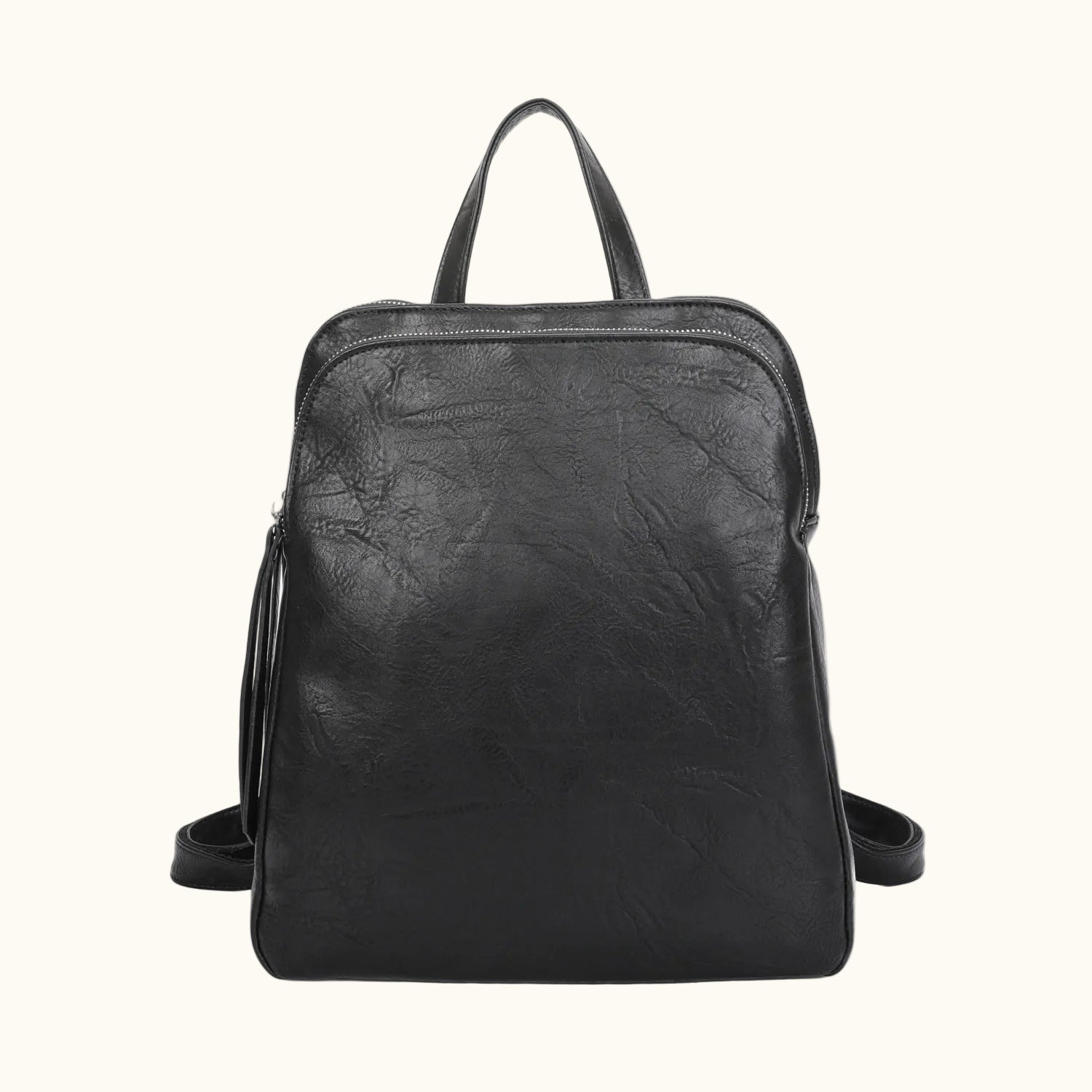 Black leather backpack on a white background