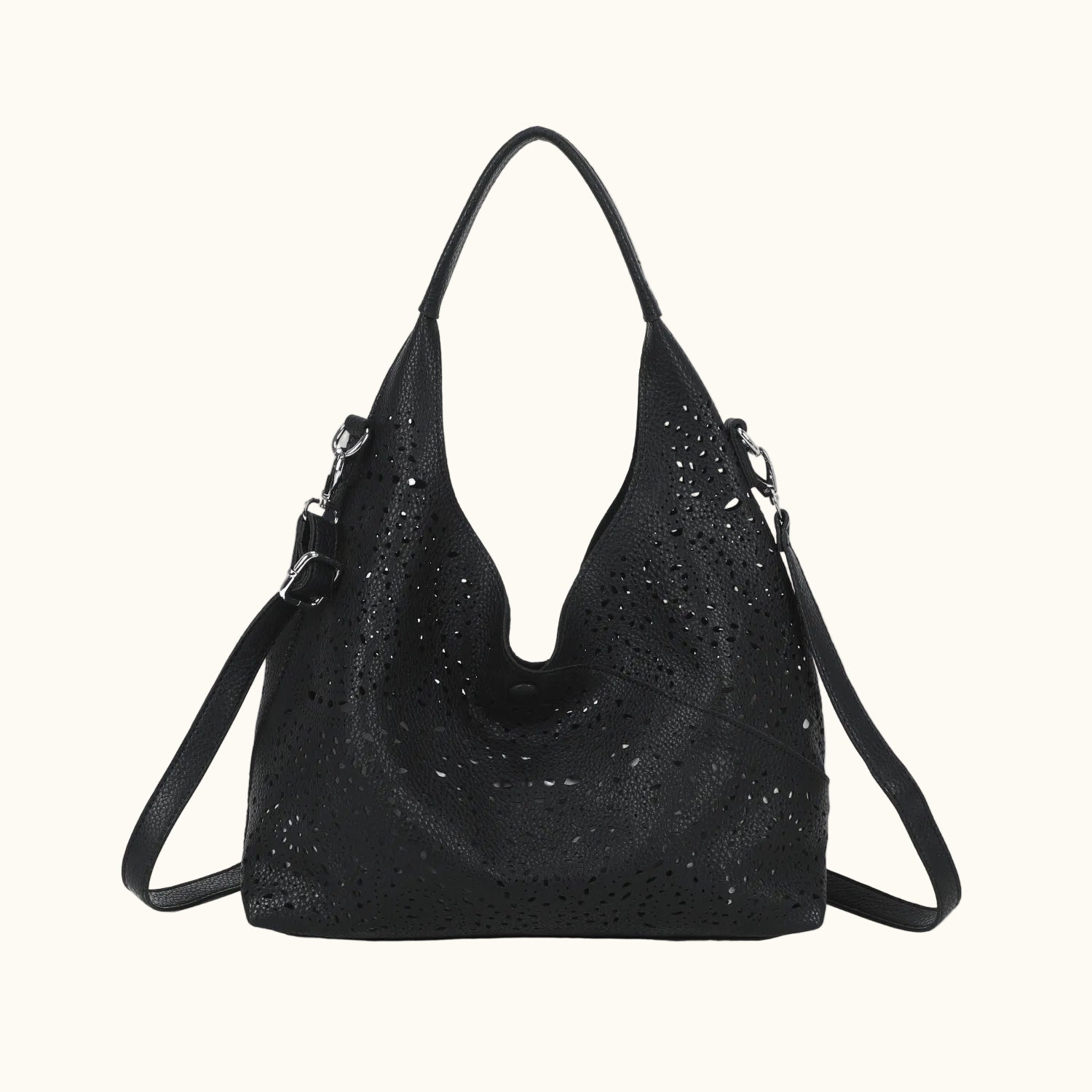 Black handbag with perforated design on a white background