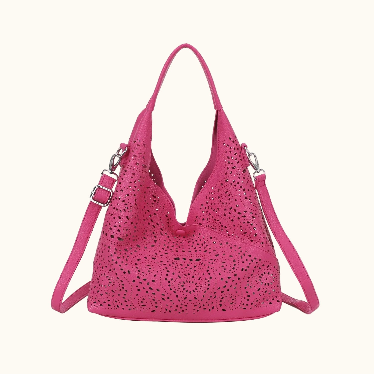 Pink handbag with cut-out design on a white background
