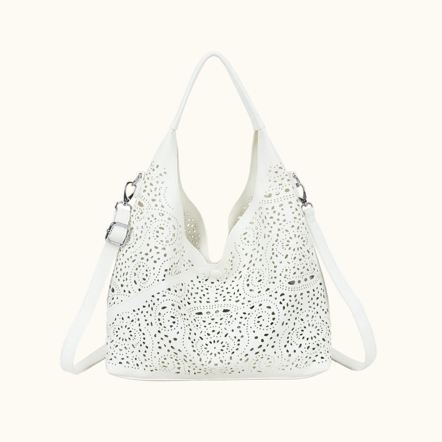 White perforated handbag on a white background
