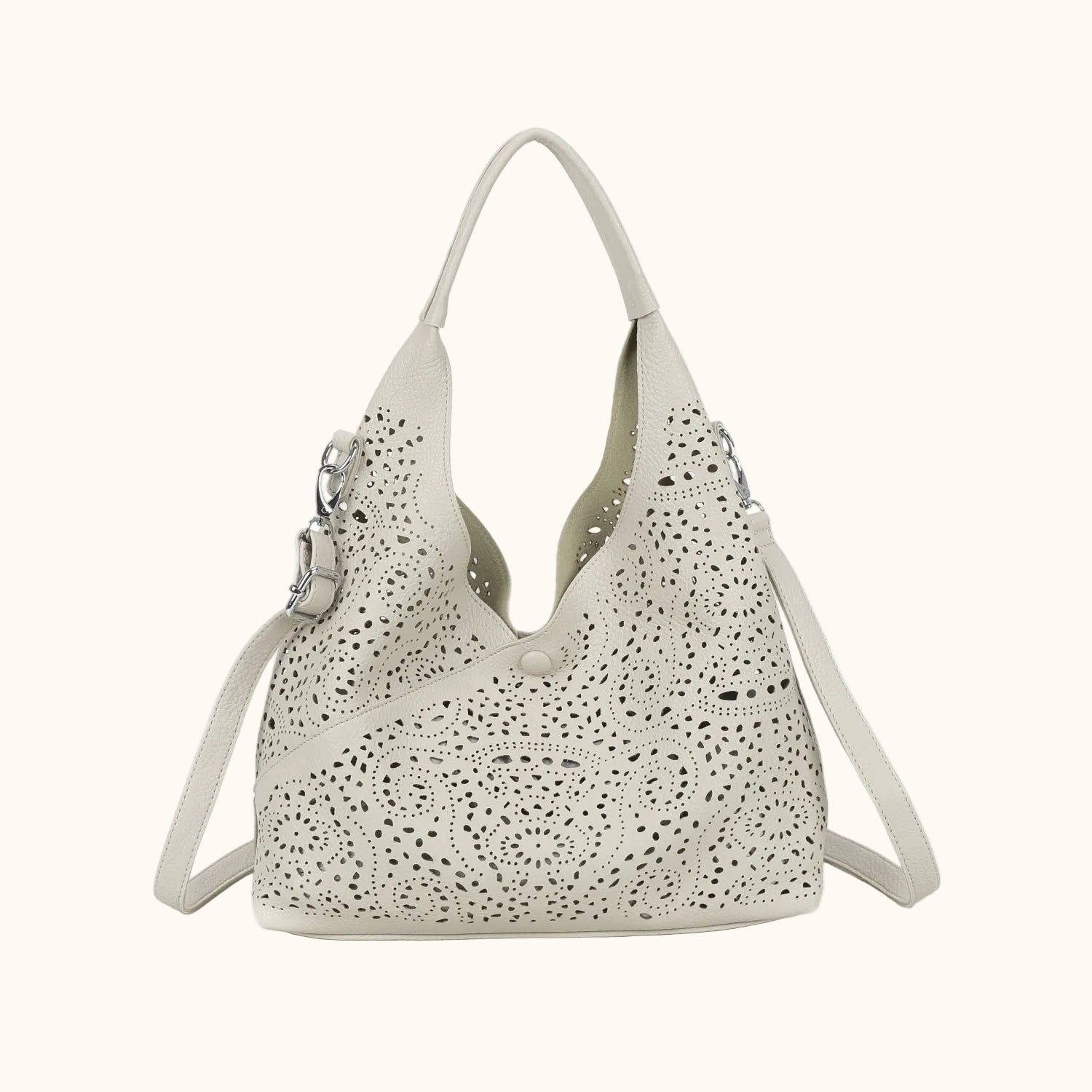 White handbag with perforated design on a white background