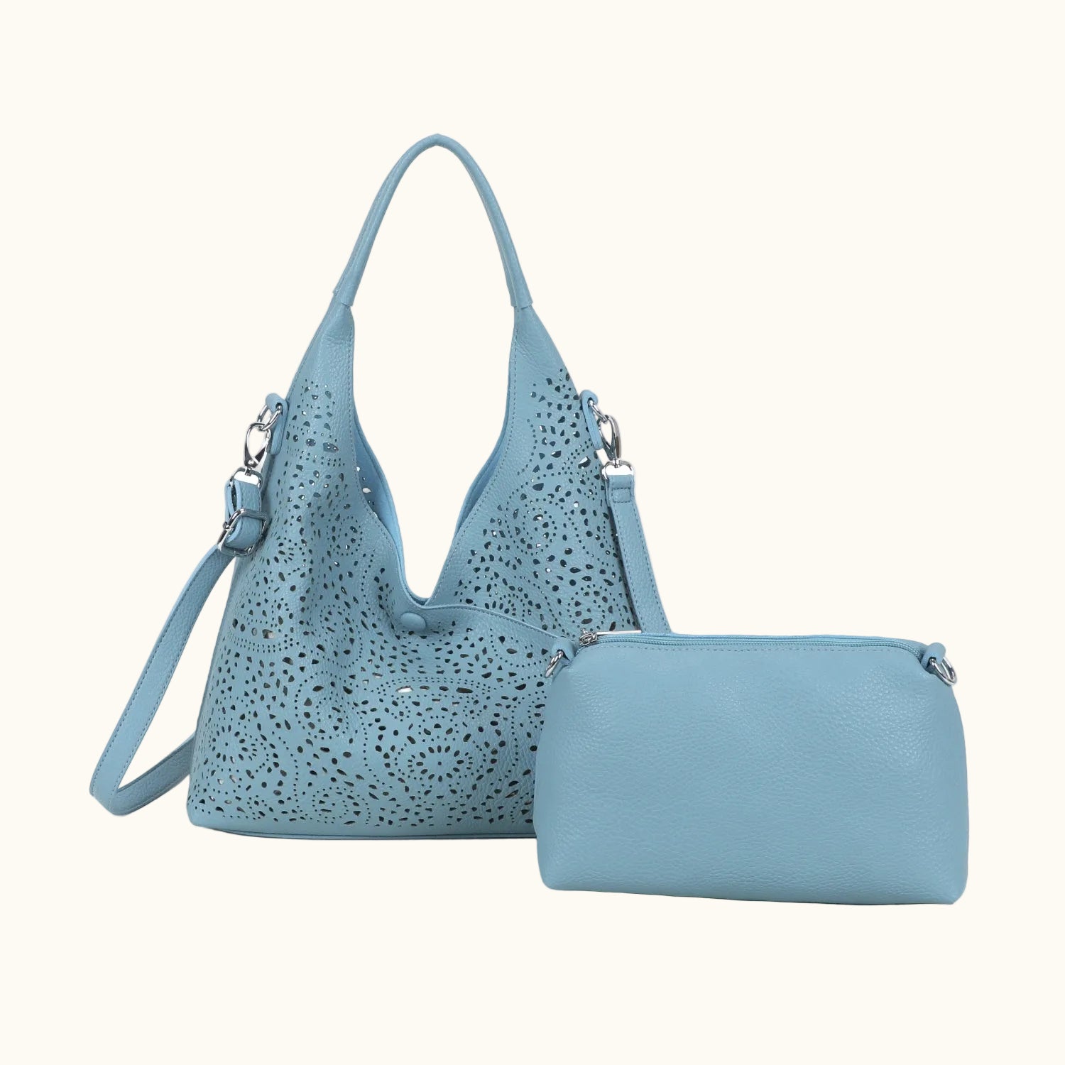 Light blue handbag with matching pouch on a white background
