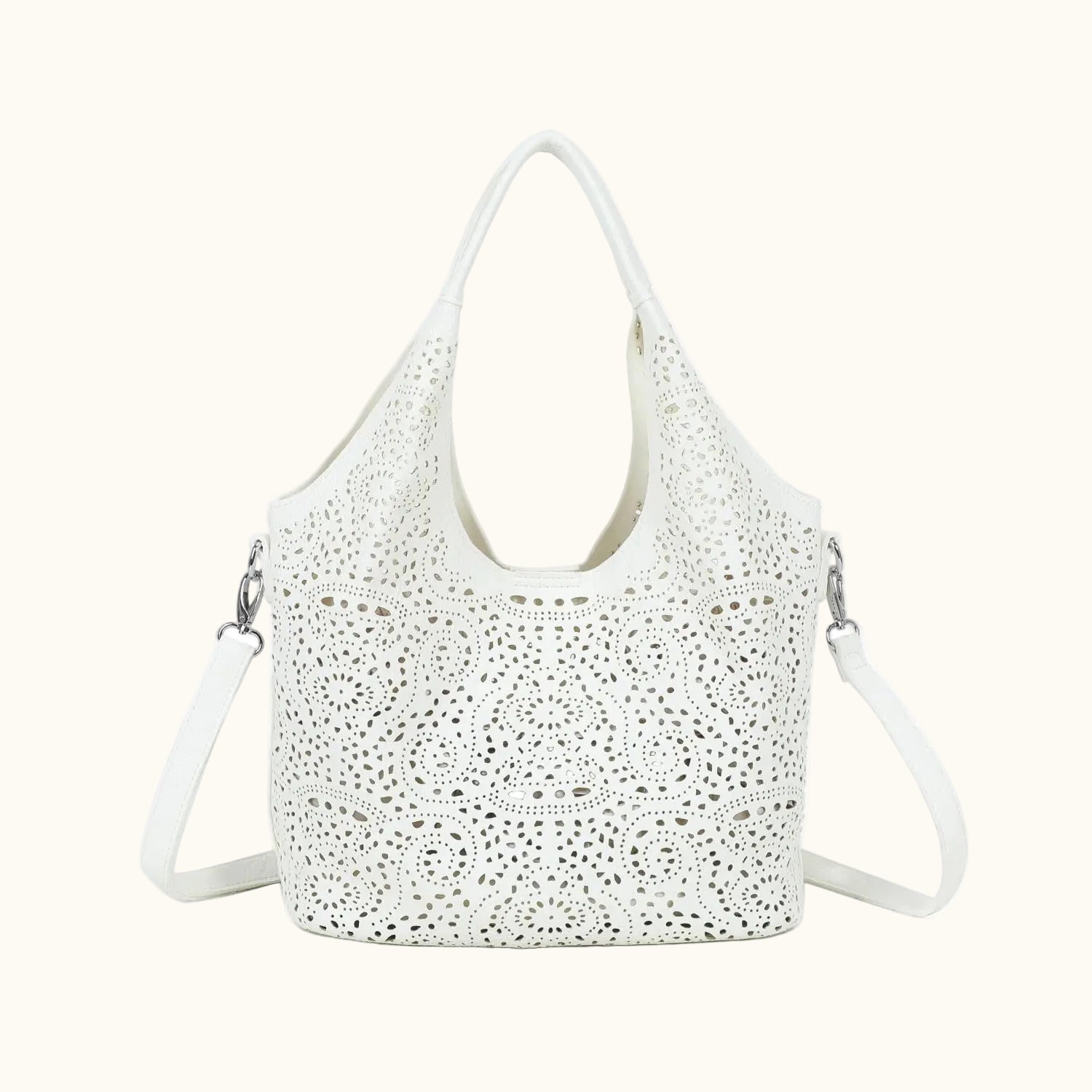 White handbag with cut-out design on a white background