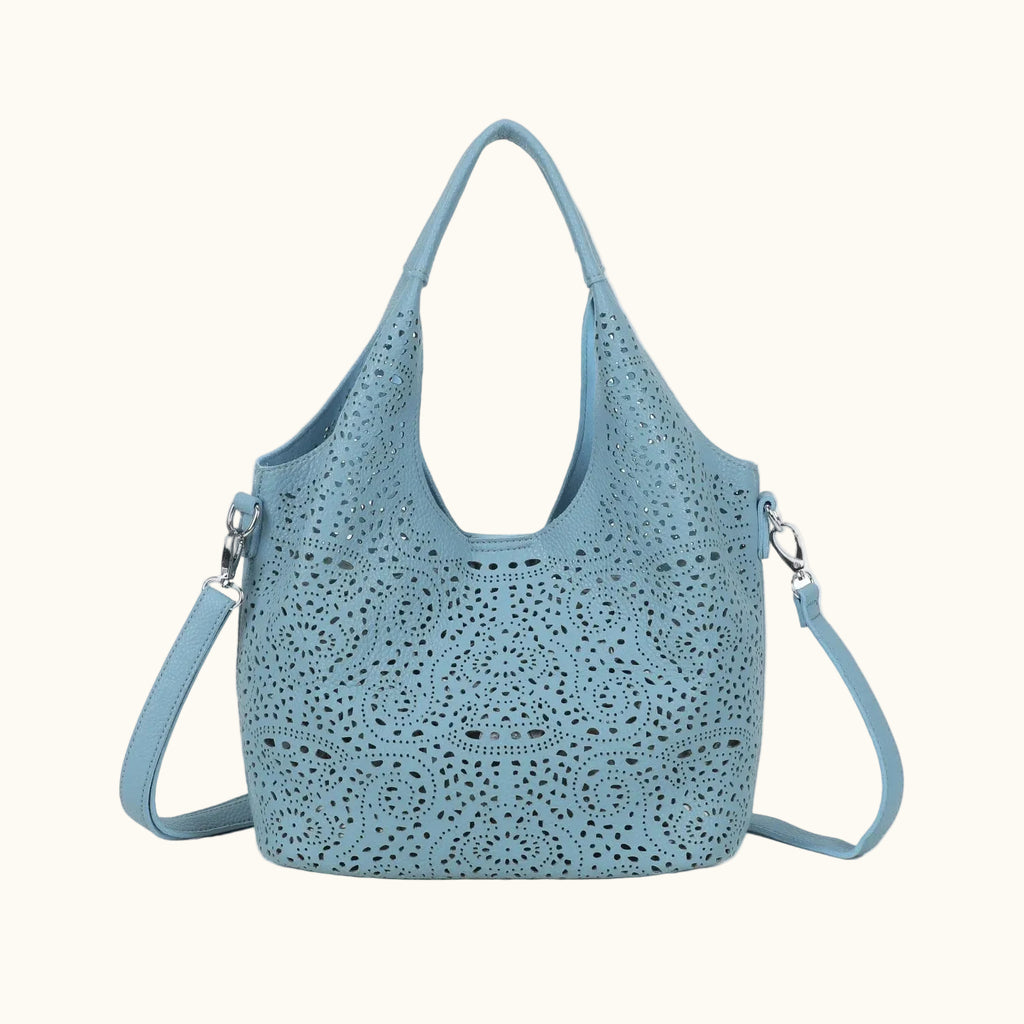 Blue perforated handbag on a white background