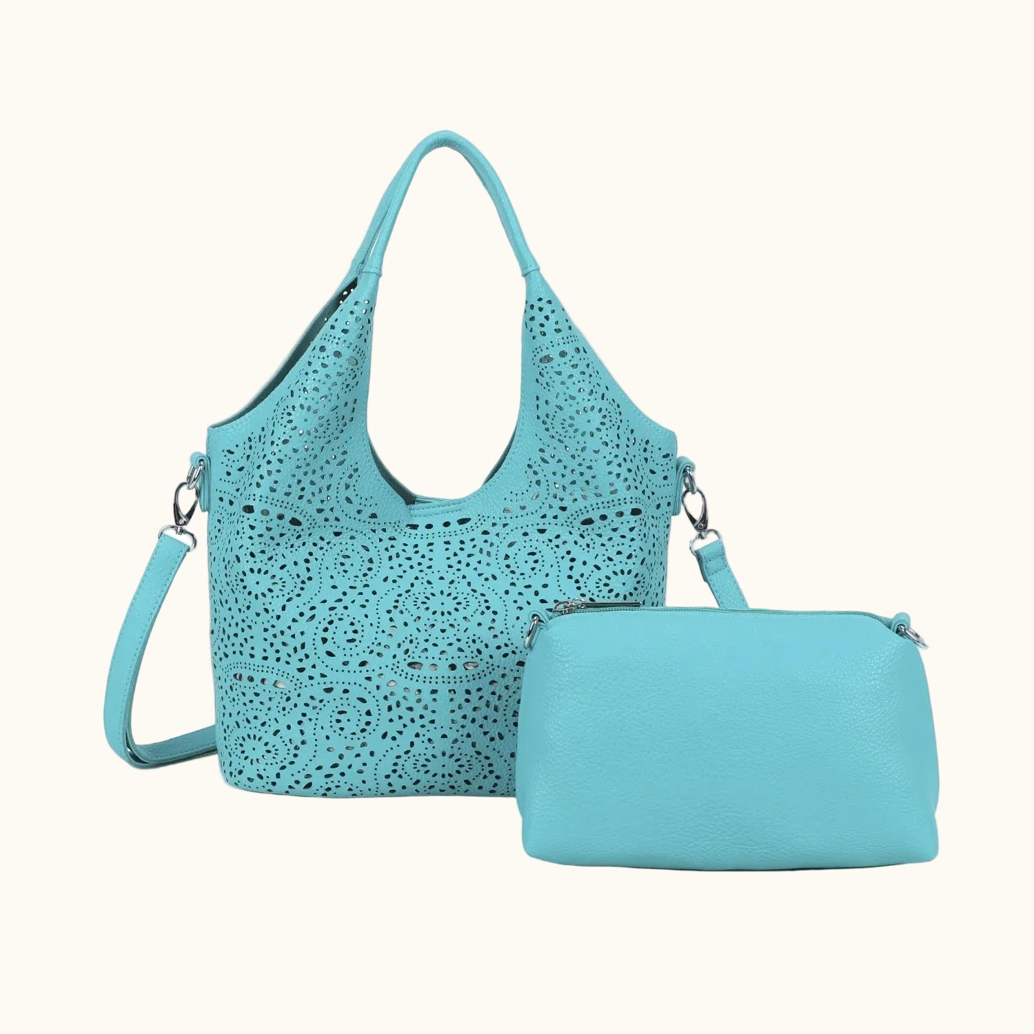 Turquoise handbag with perforated design and matching pouch on a white background