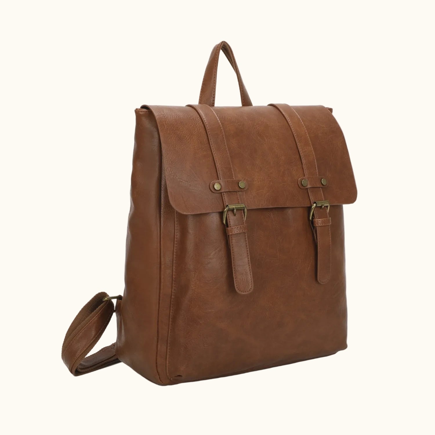 Brown leather backpack on a white background