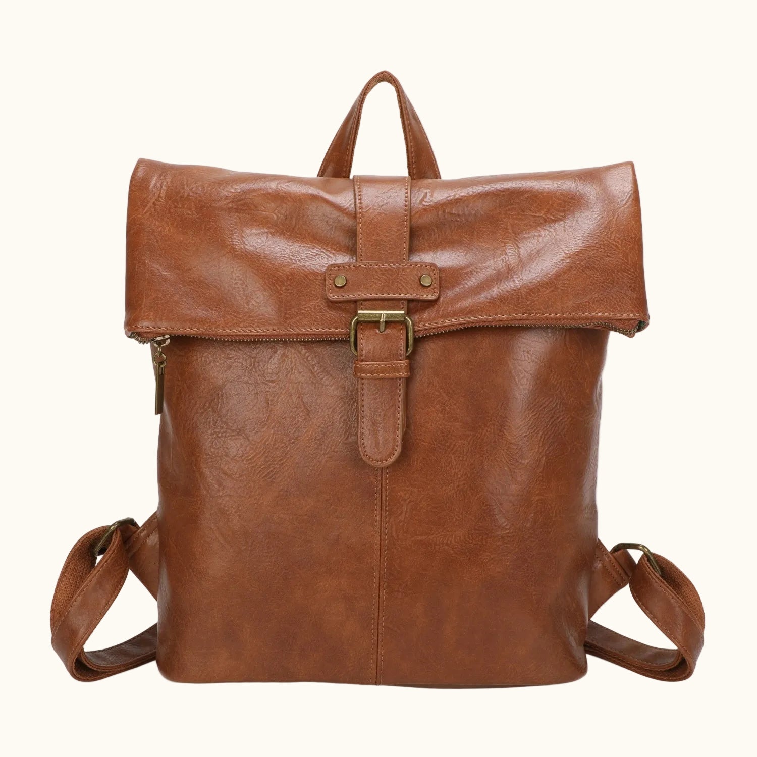 Brown leather backpack on a white background
