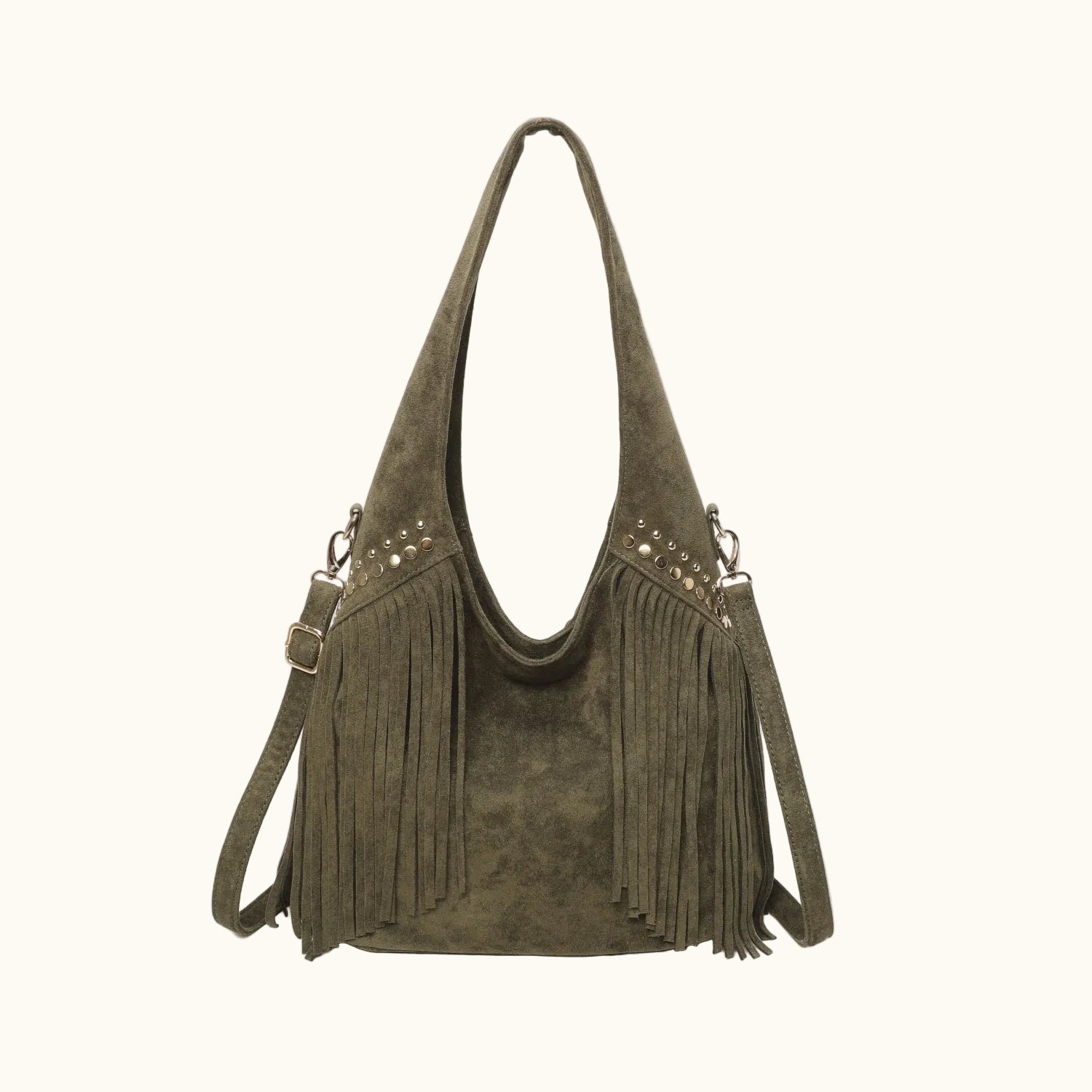 Green suede handbag with fringe details on a white background