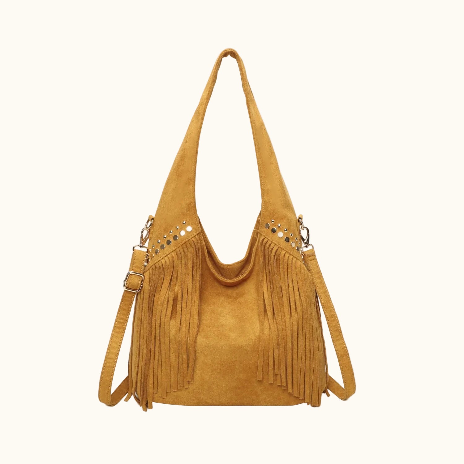 Yellow suede handbag with fringe details on a white background