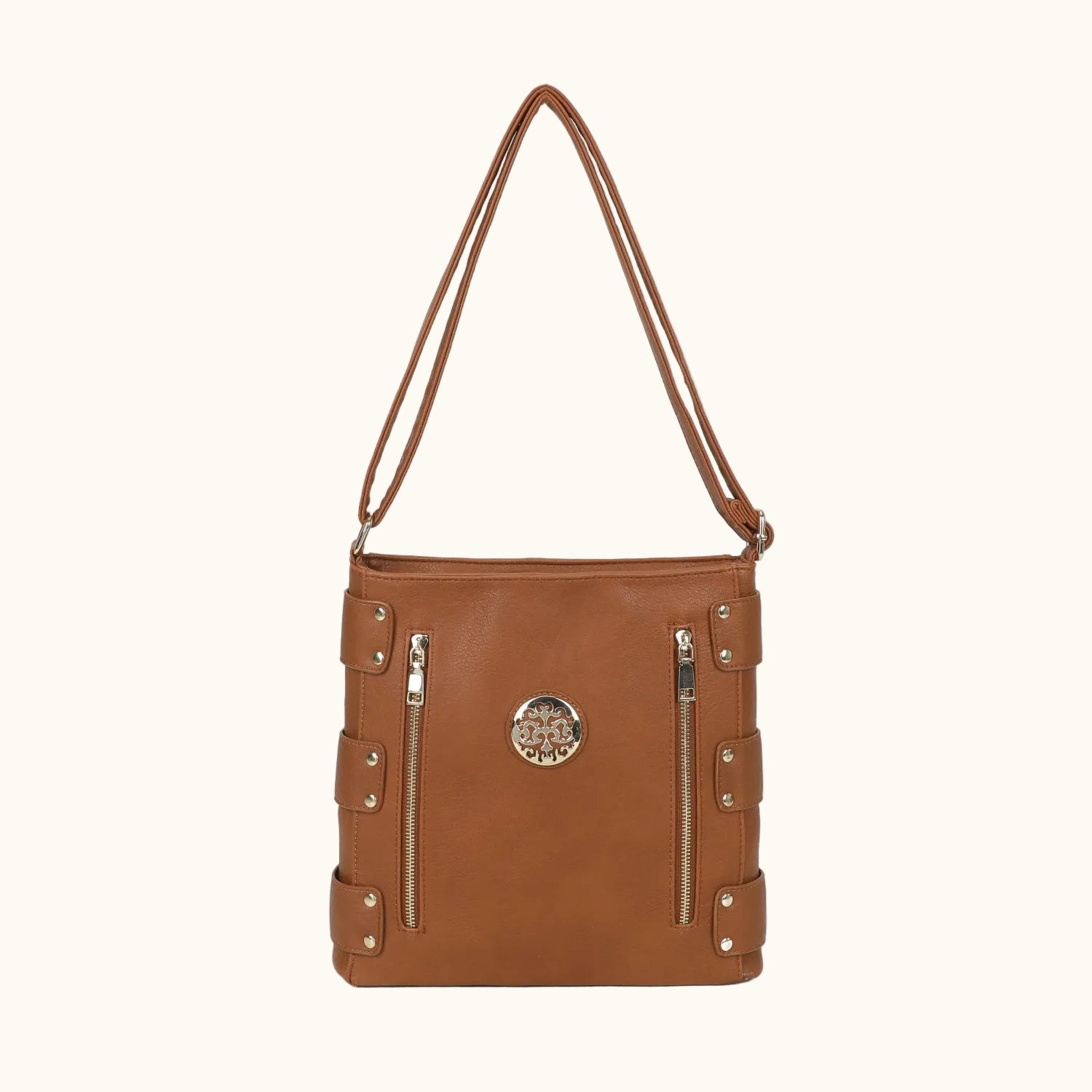 Brown leather handbag with gold accents on a white background