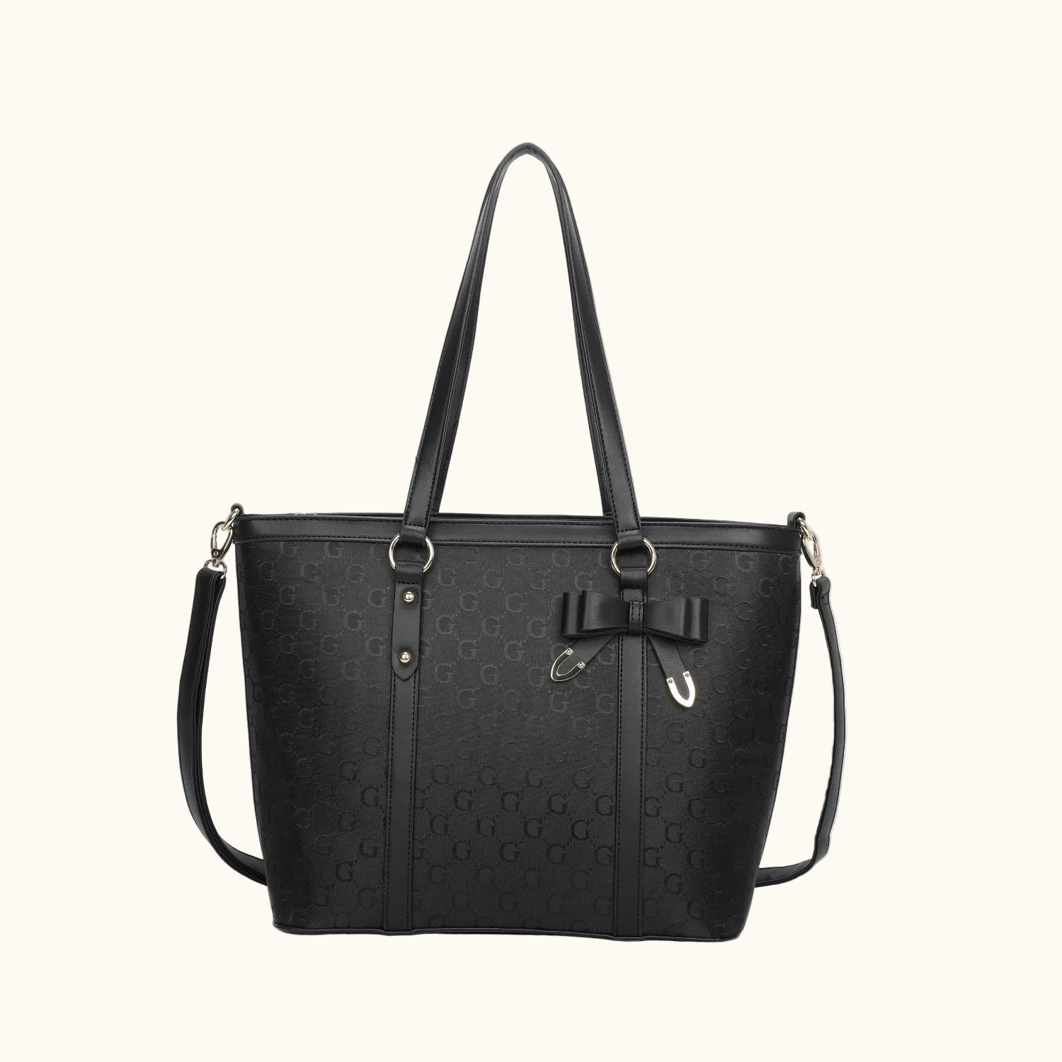 Black handbag with a bow detail on a white background