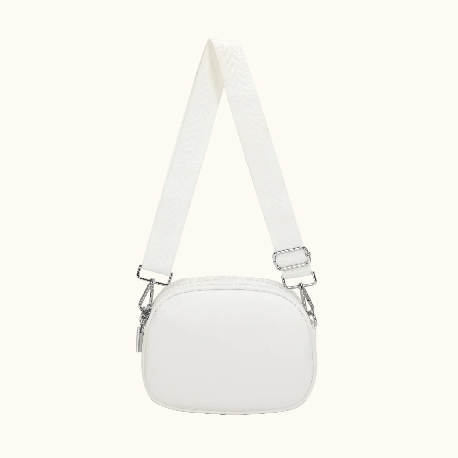 White crossbody bag on a white background