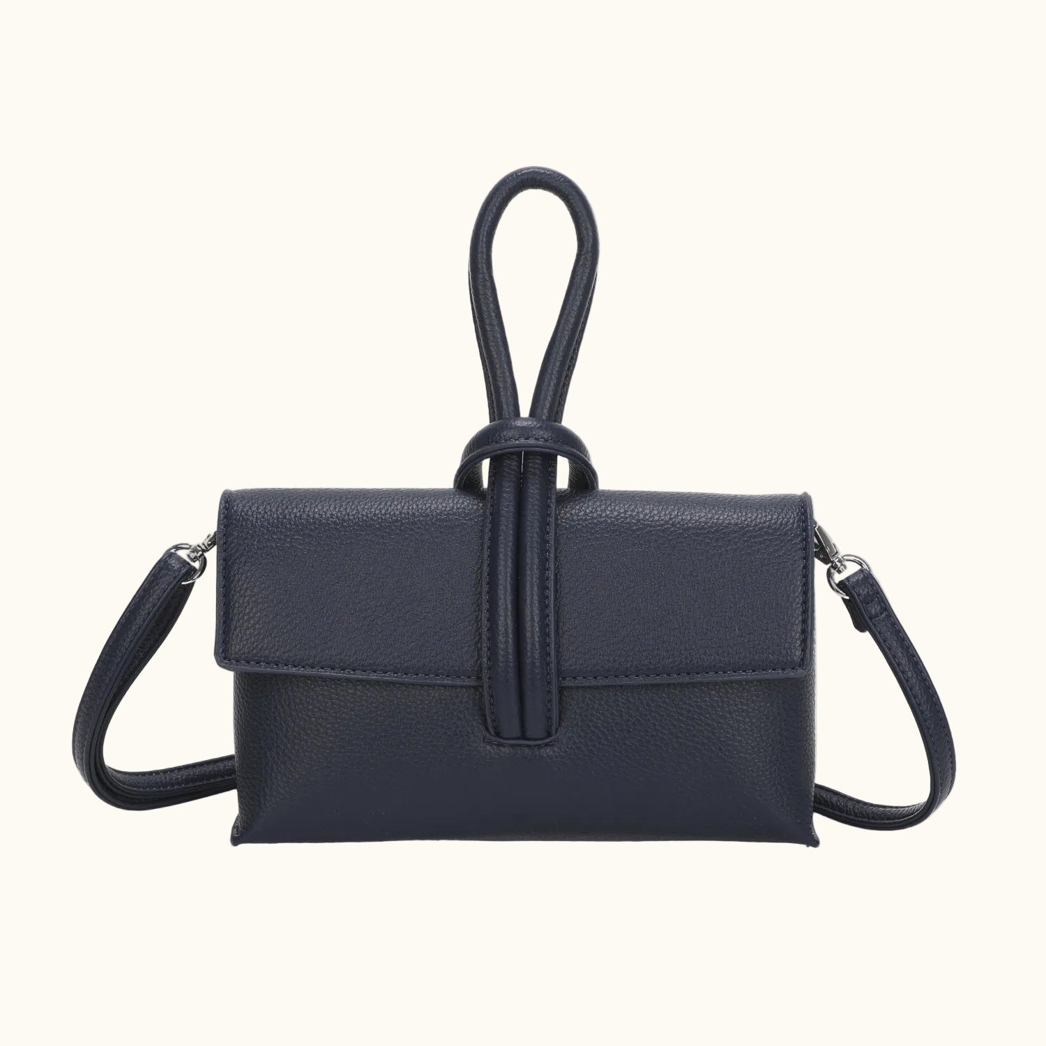 Black handbag with a strap on a white background