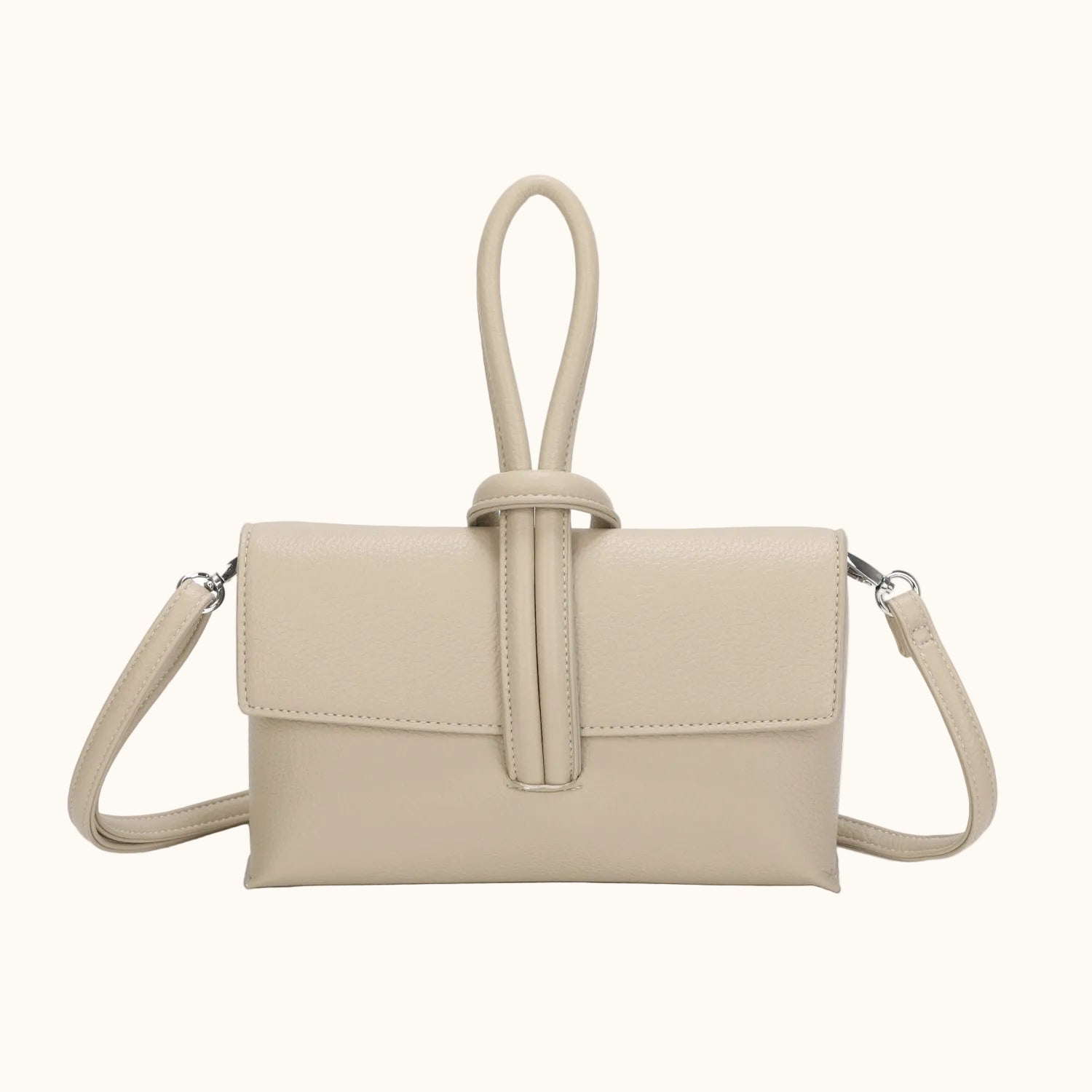 Beige handbag with a strap on a white background