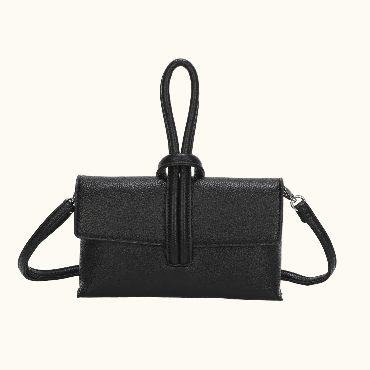 Orange handbag with a strap on a white background