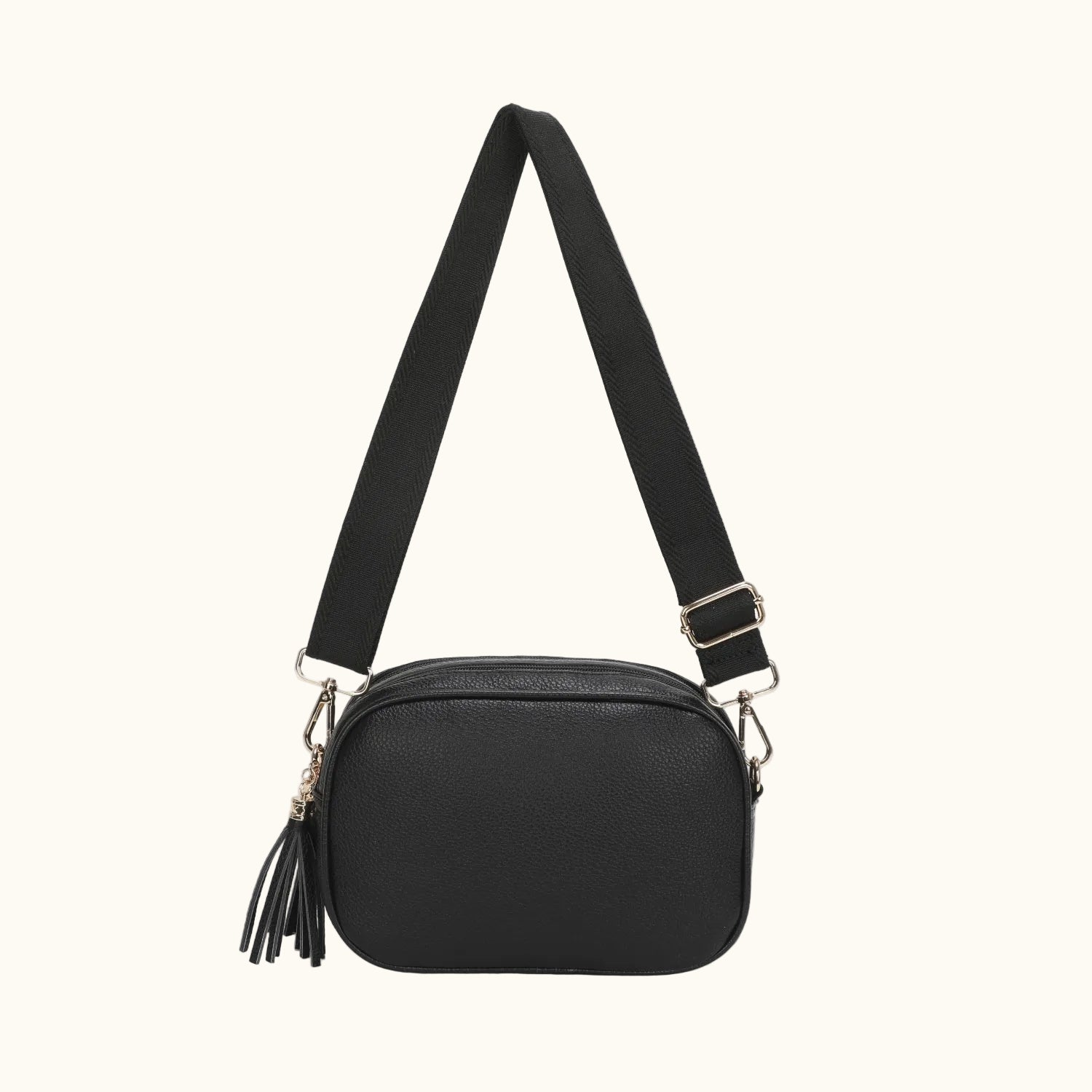 Black crossbody bag with a strap on a white background