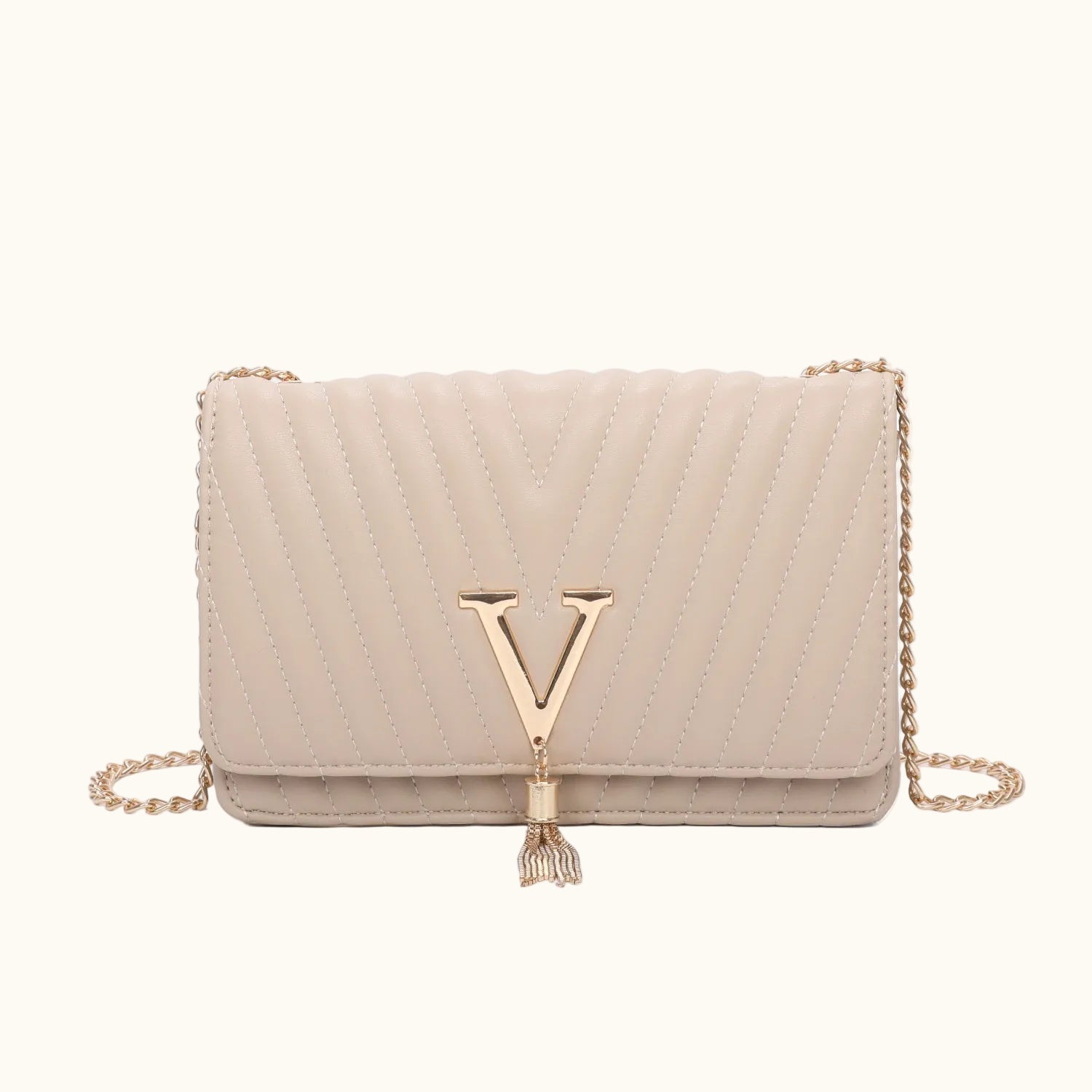Beige handbag with gold chain and 'V' logo on a white background
