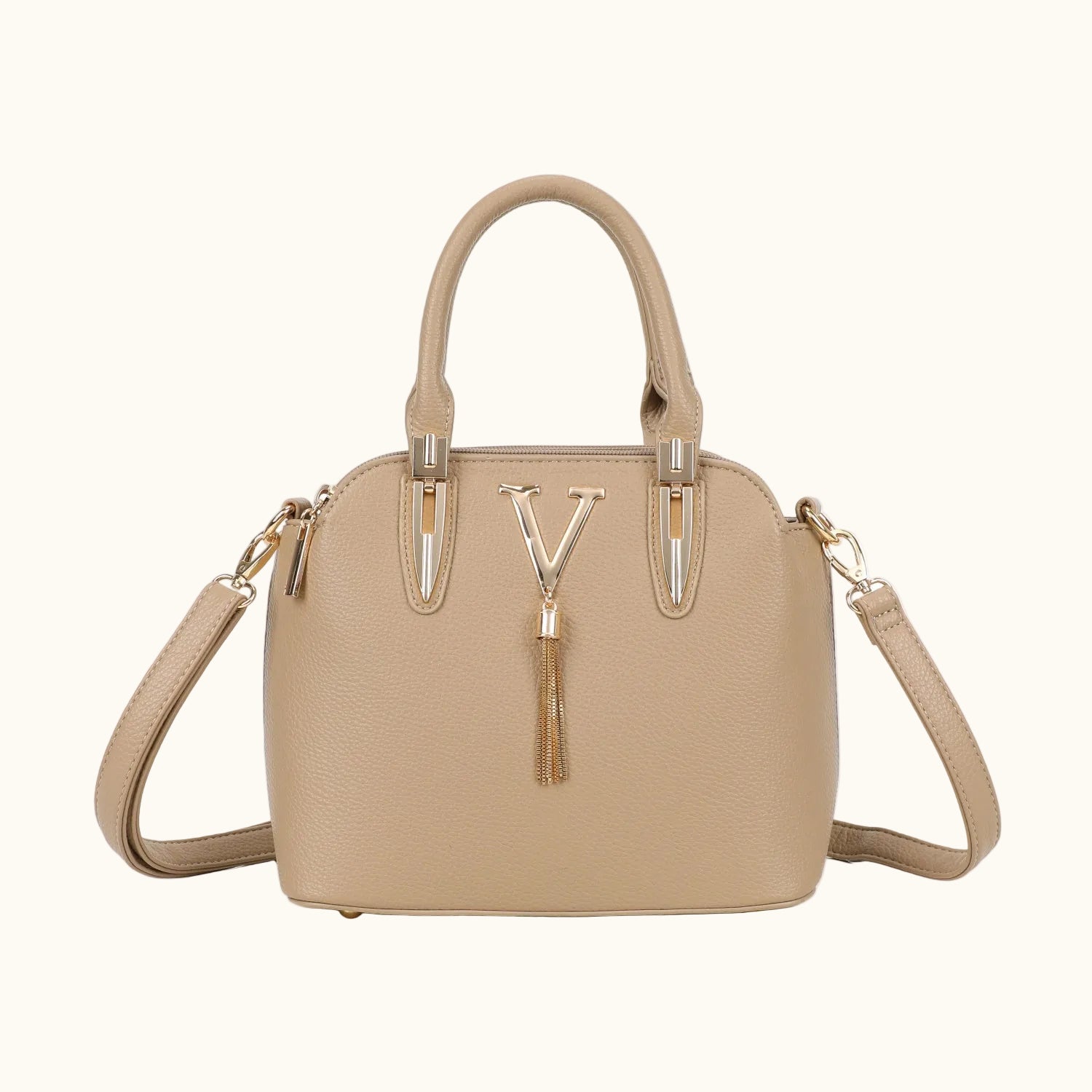 Beige handbag with a decorative clasp on a white background
