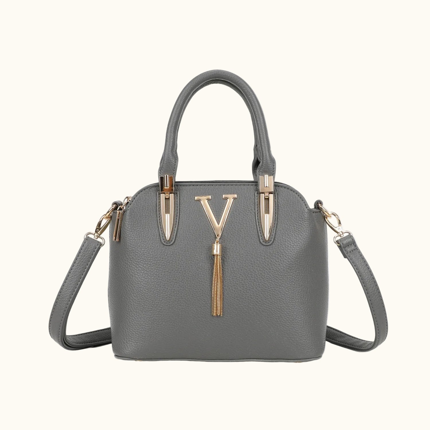 Gray handbag with gold accents on a white background