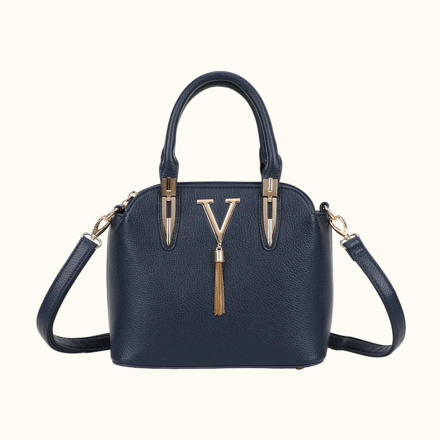 Navy blue handbag with gold accents on a white background