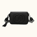 Black handbag with a decorative strap on a white background