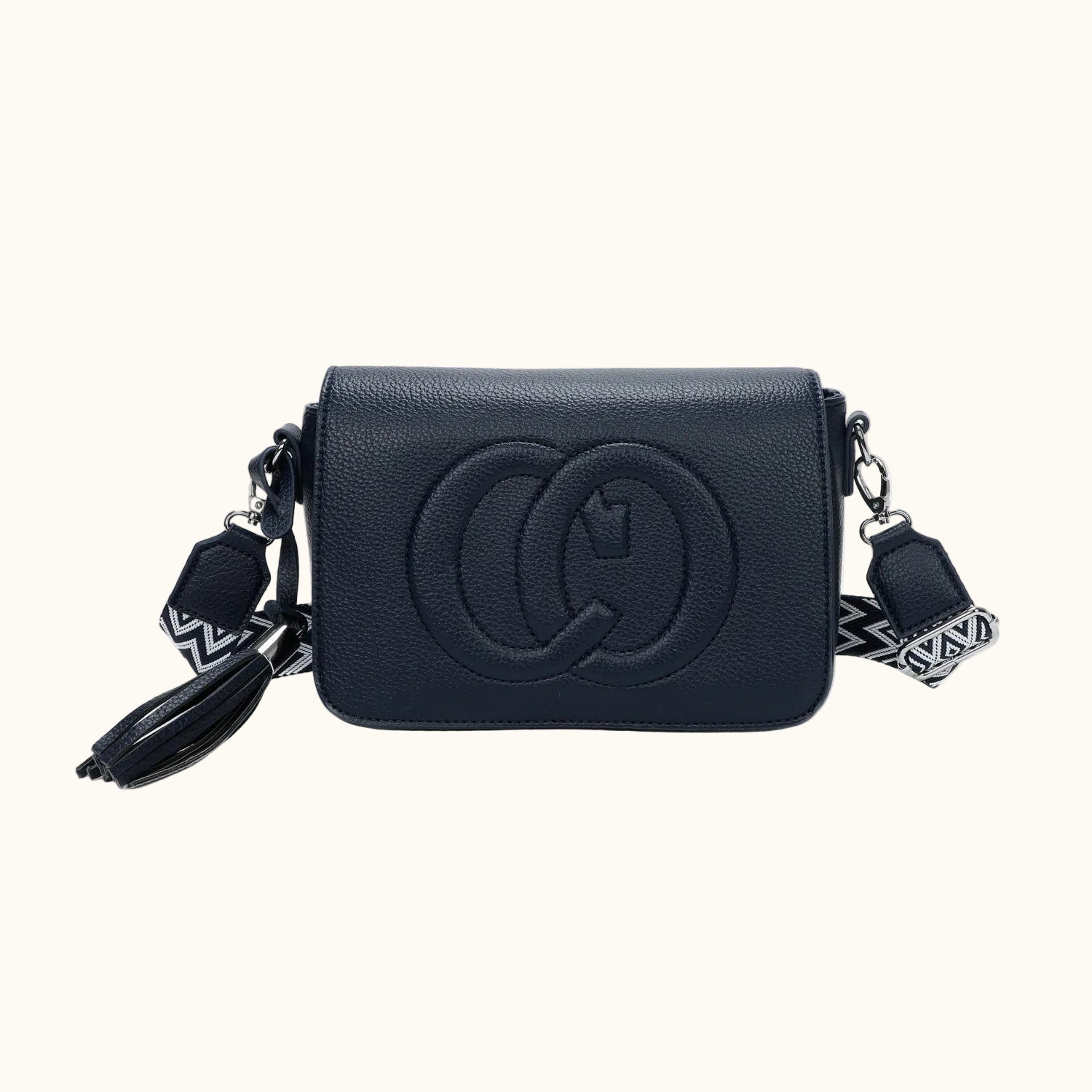 Black handbag with a brand logo on a white background
