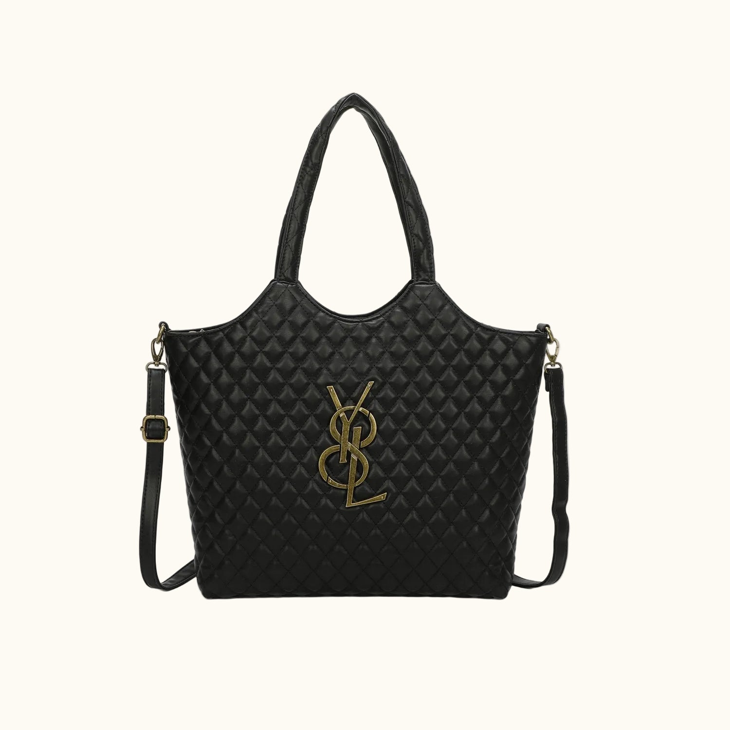 Black quilted handbag with a gold logo on a white background