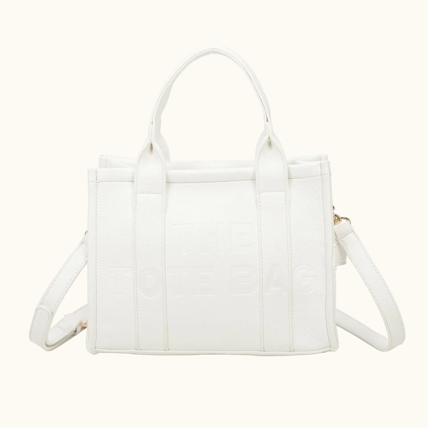 White handbag with quilted design on a white background