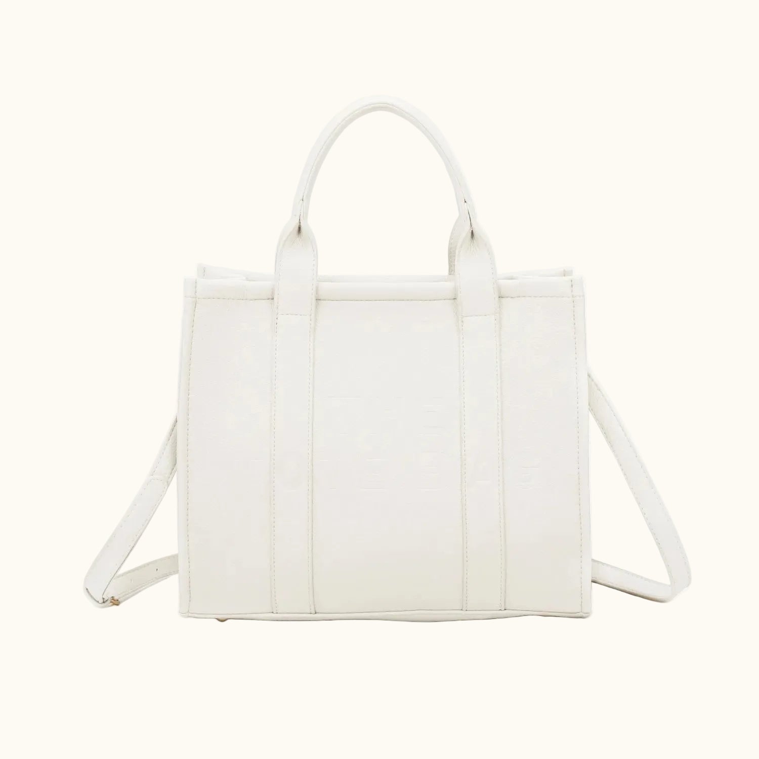White tote bag with shoulder strap on a white background