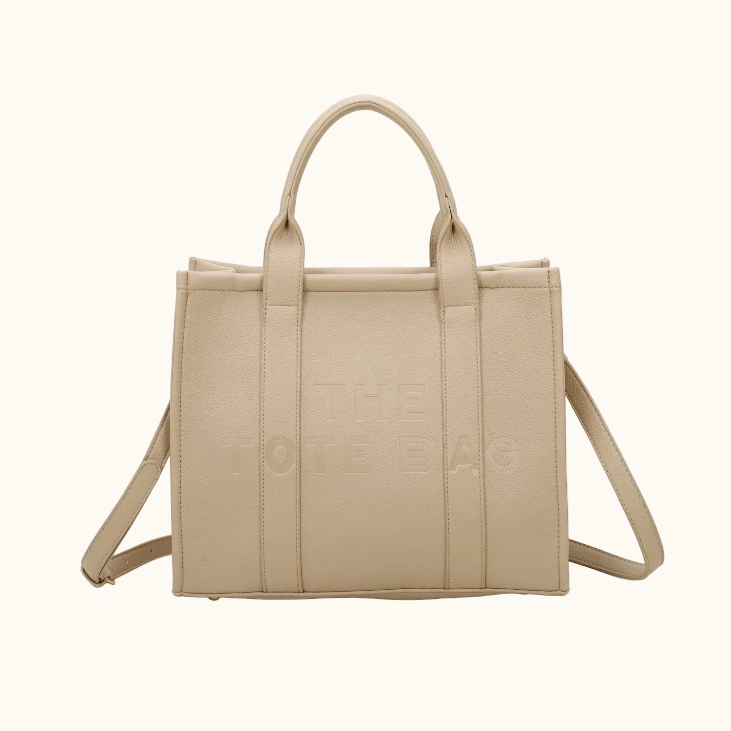 Beige handbag with 'Celine' branding on a white background