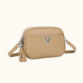 Beige crossbody bag with a visible brand logo on a white background