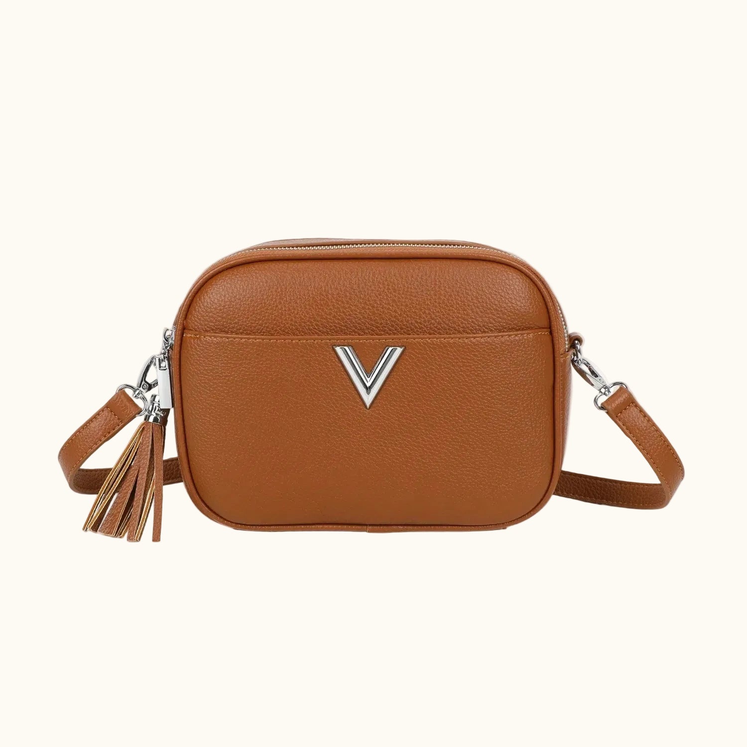 Brown leather crossbody bag with a visible brand logo on a white background