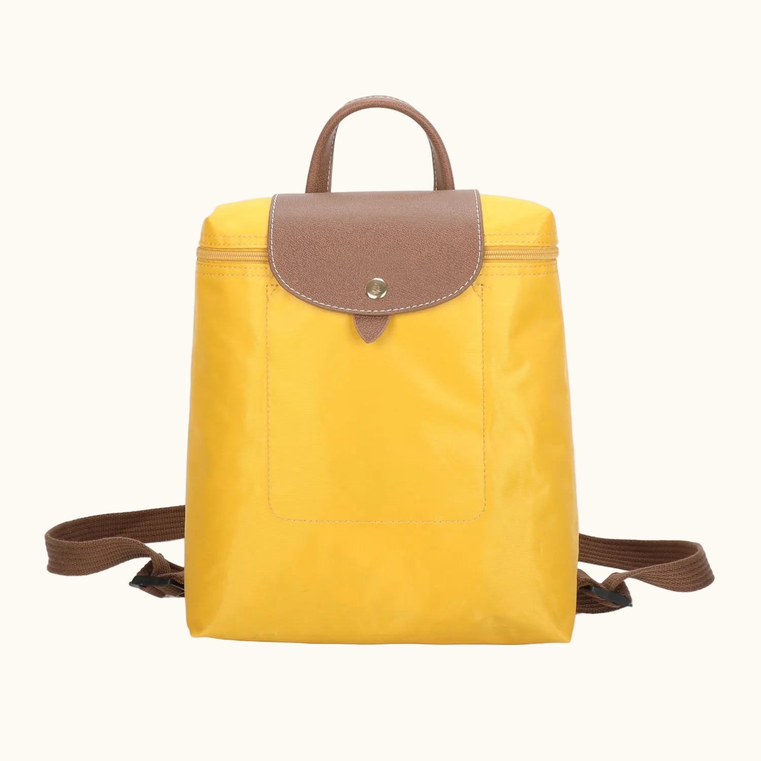 Yellow backpack with brown accents on a white background