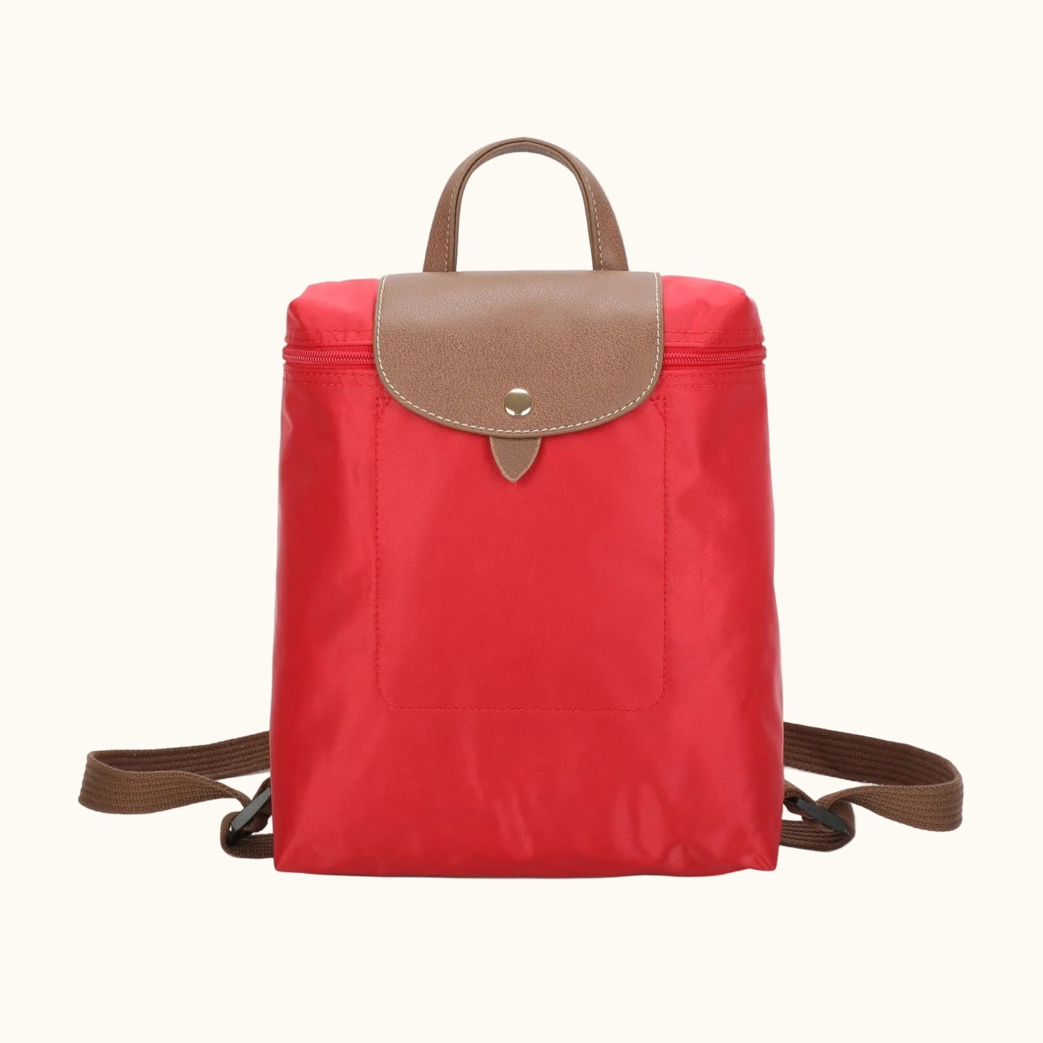 Red backpack with brown accents on a white background