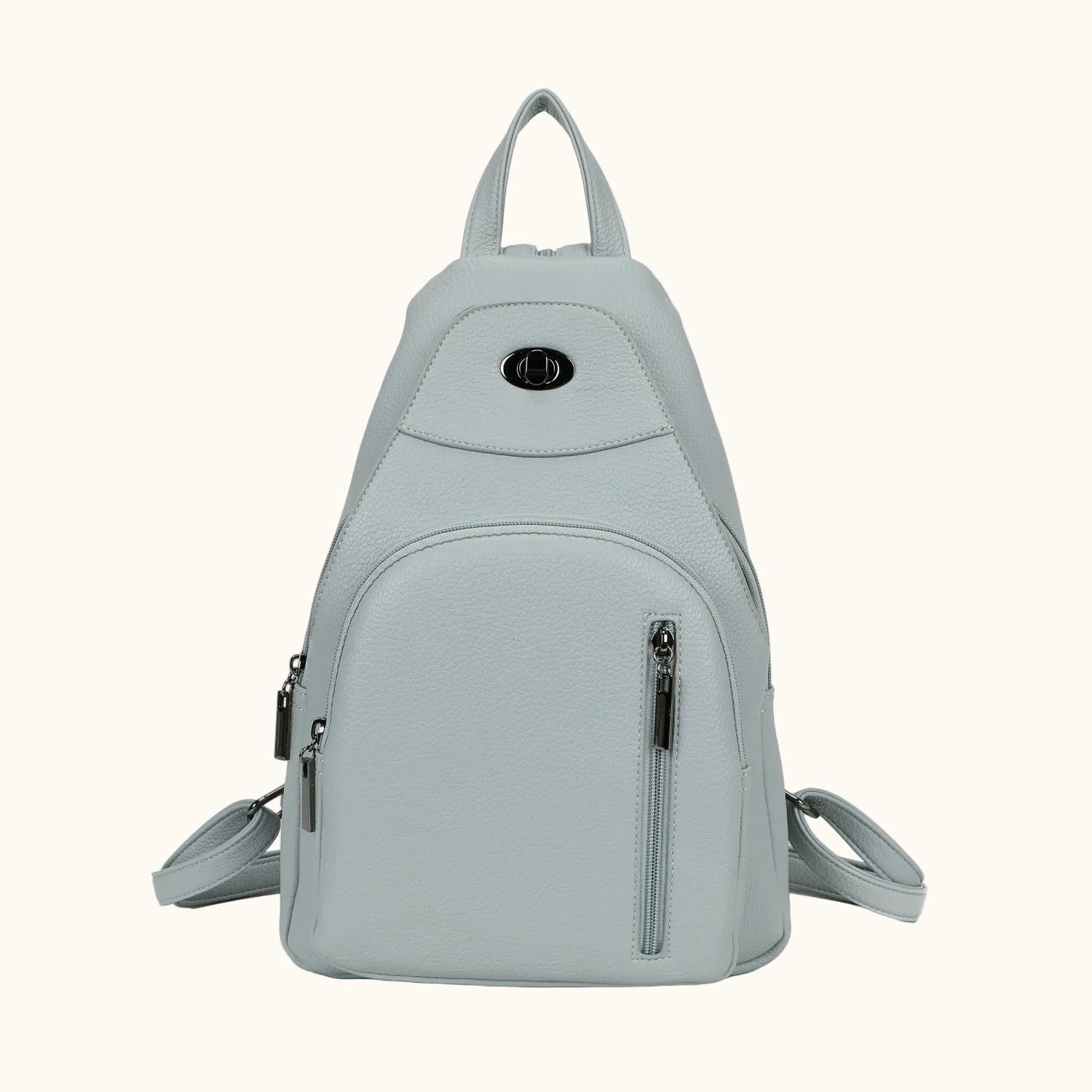 Light gray backpack with multiple zippers on a white background