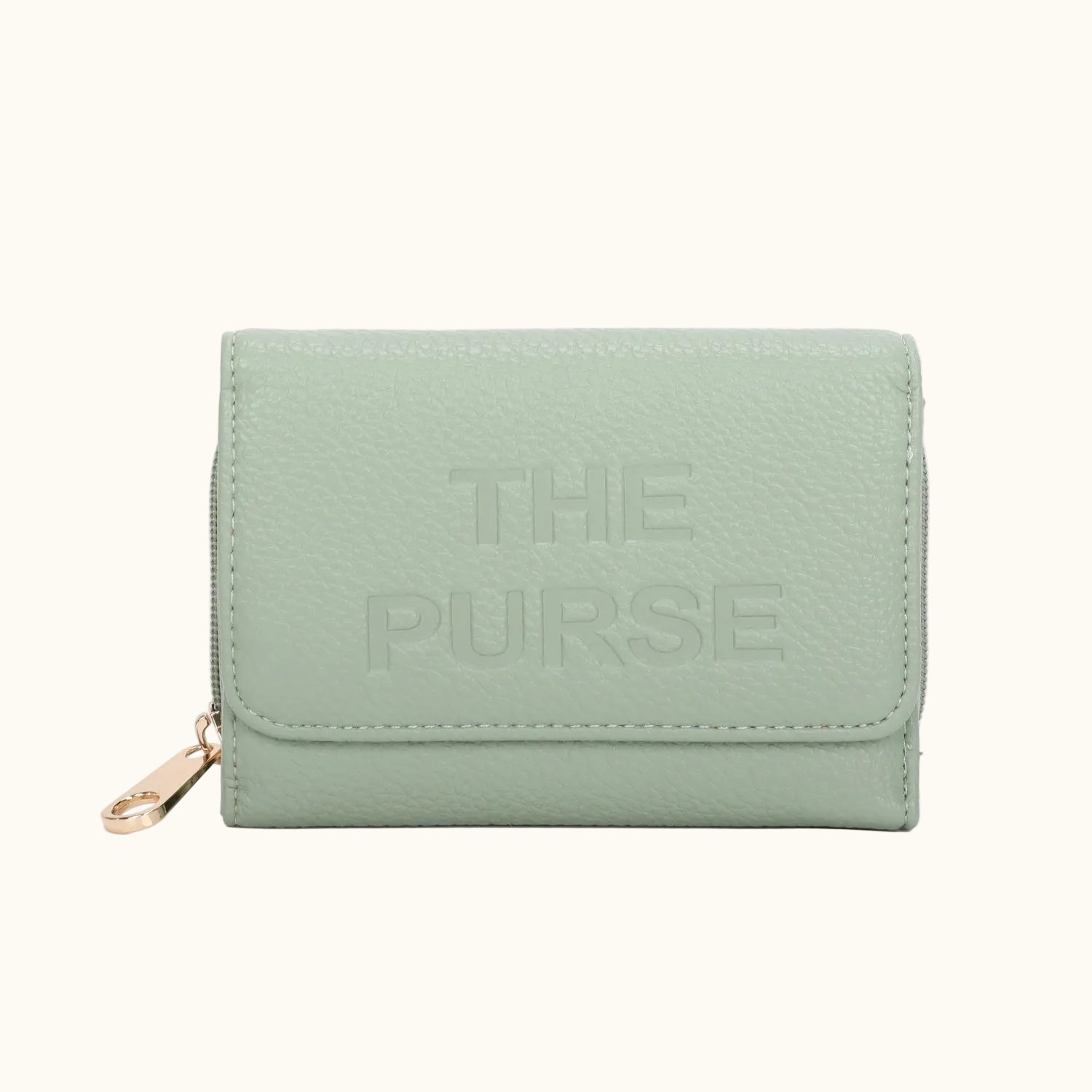 Light green wallet with 'THE PURSE' text on a white background