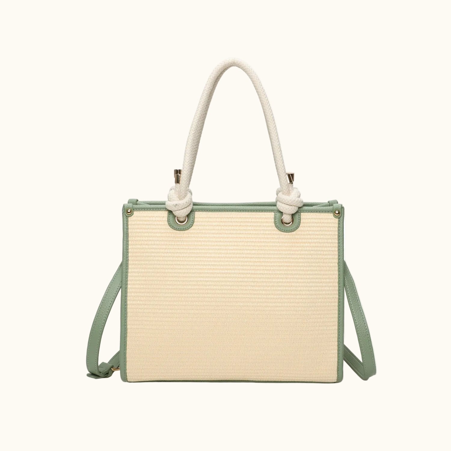 Beige handbag with green accents on a white background