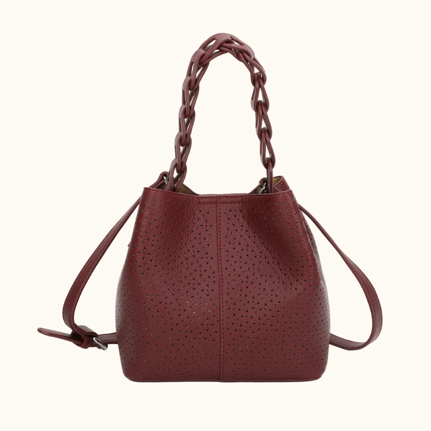 Brown handbag with braided handle on a white background